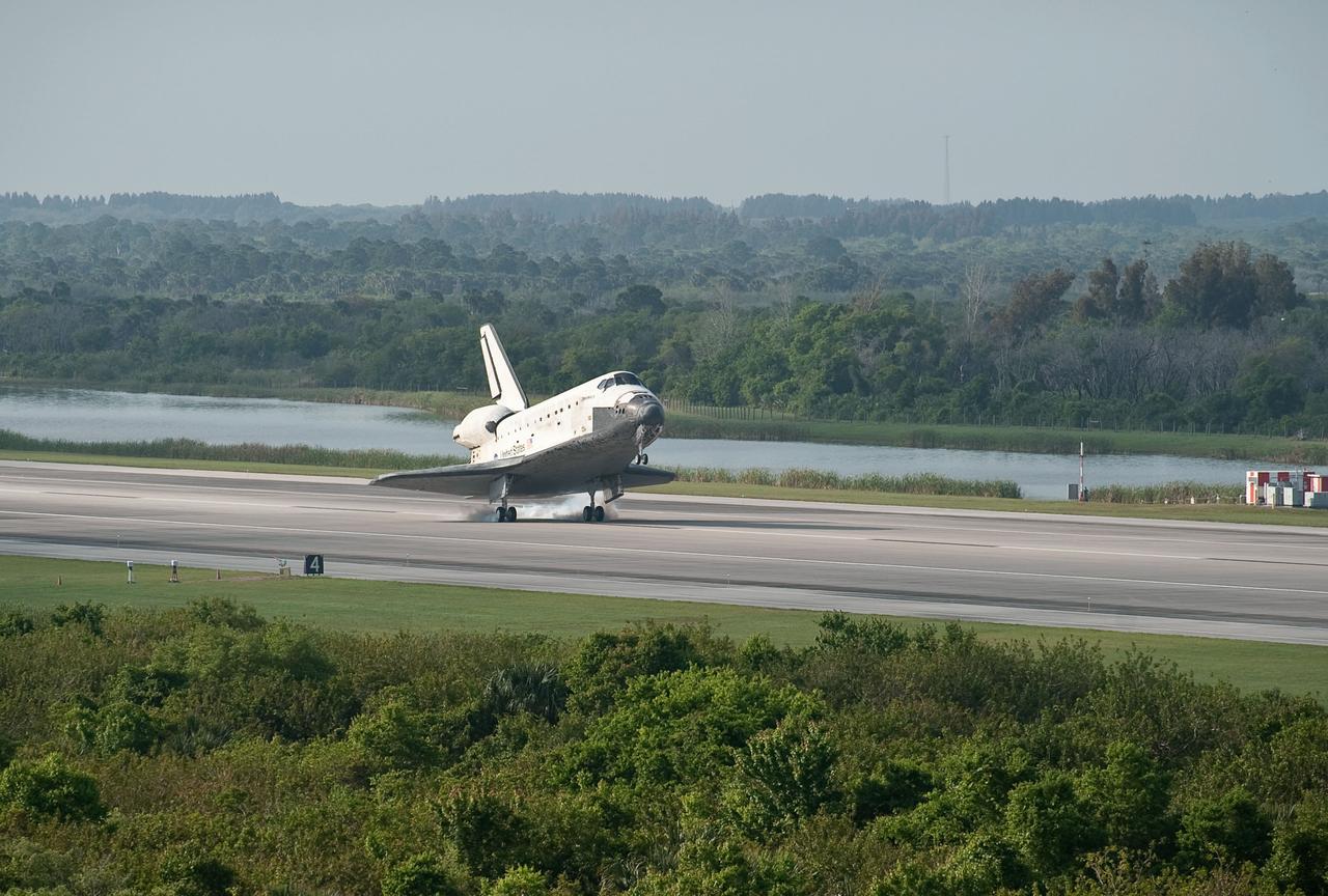 STS131-S-086 (20 April 2010) --- The space shuttle Discovery is seen as it lands at the Kennedy Space Center in Cape Canaveral, Florida, on April 20, 2010. Discovery and the STS-131 mission crew, NASA astronauts Alan Poindexter, commander; James P. Dutton Jr., pilot; Dorothy Metcalf-Lindenburger, Rick Mastracchio, Stephanie Wilson, Clayton Anderson and Japanese astronaut Naoko Yamazaki, all mission specialists, returned from their mission to the International Space Station. Photo credit: NASA/Bill Ingalls