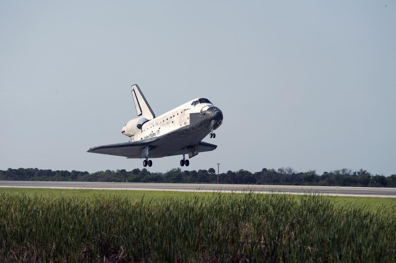 STS131-S-098 (20 April 2010) --- Space shuttle Discovery lands on Runway 33 at the Shuttle Landing Facility at NASA's Kennedy Space Center in Florida at 9:08 a.m. (EDT) on April 20, 2010, completing the 15-day STS-131 mission to the International Space Station. Main gear touchdown was at 9:08:35 a.m. followed by nose gear touchdown at 9:08:47 a.m. and wheels stop at 9:09:33 a.m. Aboard are NASA astronauts Alan Poindexter, commander; James P. Dutton Jr., pilot; Dorothy Metcalf-Lindenburger, Rick Mastracchio, Stephanie Wilson, Clayton Anderson and Japanese astronaut Naoko Yamazaki, all mission specialists. The seven-member STS-131 crew carried the Leonardo Multi-Purpose Logistics Module, filled with supplies, a new crew sleeping quarters and science racks that were transferred to the station's laboratories. The crew also switched out a gyroscope on the station?s truss, installed a spare ammonia storage tank and retrieved a Japanese experiment from the station?s exterior. STS-131 is the 33rd shuttle mission to the station and the 131st shuttle mission overall.