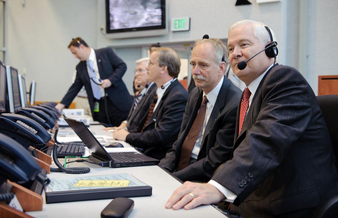 STS132-S-012 (14 May 2010)  --- Secretary of Defense Dr. Robert M. Gates, right, NASA Associate Administrator for Space Operations William H. Gerstenmaier, center, and other NASA mission managers monitor the launch of the space shuttle Atlantis and the STS-132 mission from Firing Room Four of the NASA Kennedy Space Center Launch Control Center, Friday, May 14, 2010 in Cape Canaveral Florida. Space shuttle Atlantis is embarking on its final planned mission. During the 12-day flight, Atlantis and six astronauts will fly to the International Space Station, leaving behind a Russian Mini Research Module, a set of batteries for the station's truss and dish antenna, along with other replacement parts. Atlantis' 32nd flight is scheduled to last 12 days and include three spacewalks and extensive robotics work.  Photo credit: NASA/Bill Ingalls