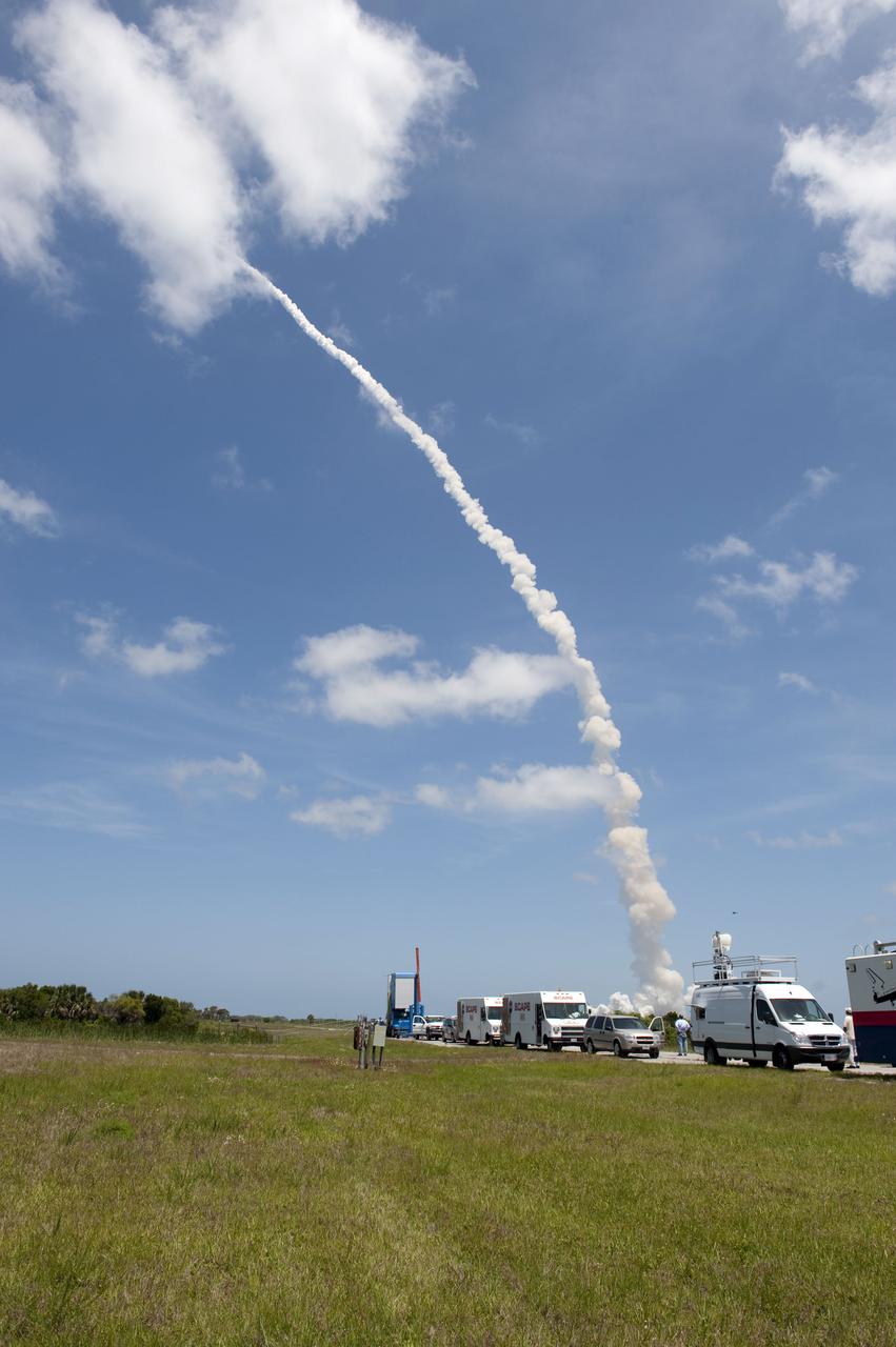 STS132-S-070 (14 May 2010) --- Convoy vehicles are standing by at the Shuttle Landing Facility at NASA's Kennedy Space Center in the event a Return-to-Launch-Site abort should be necessary following the launch of space shuttle Atlantis to the International Space Station. Liftoff from Launch Pad 39A occurred right on time at 2:20 p.m. EDT on May 14. Atlantis' primary payload for the STS-132 mission is the Russian-built Mini Research Module-1, which will provide additional storage space and a new docking port for Russian Soyuz and Progress spacecraft aboard the International Space Station. STS-132 is the 132nd shuttle flight, the 32nd for Atlantis and the 34th shuttle mission dedicated to station assembly and maintenance. For more information on the STS-132 mission objectives, payload and crew, visit www.nasa.gov/mission_pages/shuttle/shuttlemissions/sts132/index.html. Photo credit: NASA/Carl Winebarger