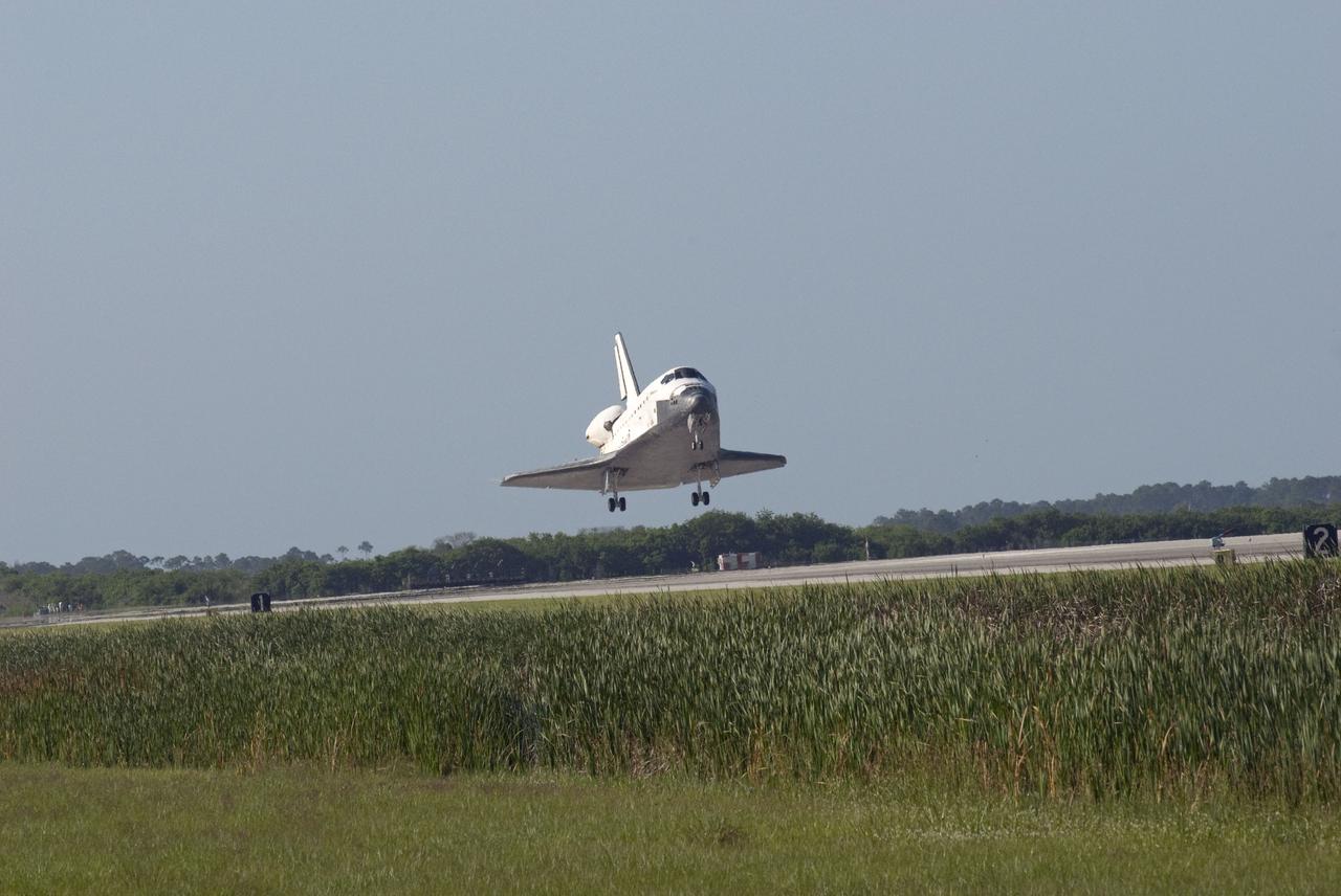STS132-S-087 (26 May 2010) --- Space shuttle Atlantis nears touchdown on Runway 33 at the Shuttle Landing Facility at NASA's Kennedy Space Center in Florida. Landing was at 8:48 a.m. (EDT) on May 26, 2010, completing the 12-day STS-132 mission to the International Space Station. Main gear touchdown was at 8:48:11 a.m., followed by nose gear touchdown at 8:48:21 a.m. and wheelstop at 8:49:18 a.m. Onboard are NASA astronauts Ken Ham, commander; Tony Antonelli, pilot; Garrett Reisman, Michael Good, Steve Bowen and Piers Sellers, all mission specialists. The six-member STS-132 crew carried the Russian-built Mini Research Module 1 (MRM1) to the orbital complex. STS-132 is the 34th shuttle mission to the station, the 132nd shuttle mission overall and the last planned flight for Atlantis.