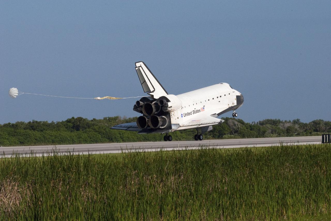 STS132-S-089 (26 May 2010) --- Space shuttle Atlantis? drag chute is deployed as the spacecraft rolls toward wheels stop on Runway 33 at the Shuttle Landing Facility at NASA's Kennedy Space Center in Florida. Landing was at 8:48 a.m. (EDT) on May 26, 2010, completing the 12-day STS-132 mission to the International Space Station. Main gear touchdown was at 8:48:11 a.m., followed by nose gear touchdown at 8:48:21 a.m. and wheelstop at 8:49:18 a.m. Onboard are NASA astronauts Ken Ham, commander; Tony Antonelli, pilot; Garrett Reisman, Michael Good, Steve Bowen and Piers Sellers, all mission specialists. The six-member STS-132 crew carried the Russian-built Mini Research Module 1 (MRM1) to the orbital complex. STS-132 is the 34th shuttle mission to the station, the 132nd shuttle mission overall and the last planned flight for Atlantis.