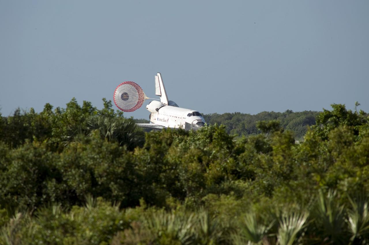 STS132-S-096 (26 May 2010) --- Space shuttle Atlantis? drag chute is deployed as the spacecraft rolls toward wheels stop on Runway 33 at the Shuttle Landing Facility at NASA's Kennedy Space Center in Florida. Landing was at 8:48 a.m. (EDT) on May 26, 2010, completing the 12-day STS-132 mission to the International Space Station. Main gear touchdown was at 8:48:11 a.m., followed by nose gear touchdown at 8:48:21 a.m. and wheelstop at 8:49:18 a.m. Onboard are NASA astronauts Ken Ham, commander; Tony Antonelli, pilot; Garrett Reisman, Michael Good, Steve Bowen and Piers Sellers, all mission specialists. The six-member STS-132 crew carried the Russian-built Mini Research Module 1 (MRM1) to the orbital complex. STS-132 is the 34th shuttle mission to the station, the 132nd shuttle mission overall and the last planned flight for Atlantis.
