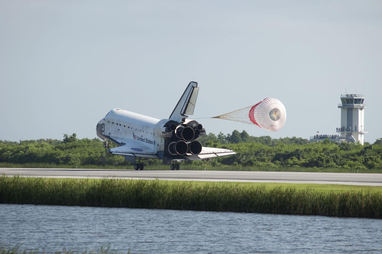 STS132-S-103 (26 May 2010) --- Space shuttle Atlantis? drag chute is deployed as the spacecraft rolls toward wheels stop on Runway 33 at the Shuttle Landing Facility at NASA's Kennedy Space Center in Florida. Landing was at 8:48 a.m. (EDT) on May 26, 2010, completing the 12-day STS-132 mission to the International Space Station. Main gear touchdown was at 8:48:11 a.m., followed by nose gear touchdown at 8:48:21 a.m. and wheelstop at 8:49:18 a.m. Onboard are NASA astronauts Ken Ham, commander; Tony Antonelli, pilot; Garrett Reisman, Michael Good, Steve Bowen and Piers Sellers, all mission specialists. The six-member STS-132 crew carried the Russian-built Mini Research Module 1 (MRM1) to the orbital complex. STS-132 is the 34th shuttle mission to the station, the 132nd shuttle mission overall and the last planned flight for Atlantis.
