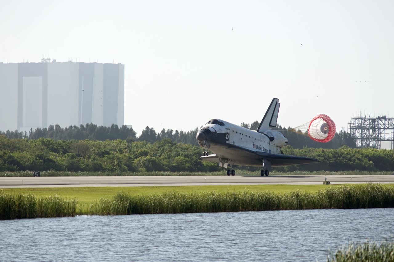 STS132-S-107 (26 May 2010) --- Space shuttle Atlantis? drag chute is deployed as the spacecraft rolls toward wheels stop on Runway 33 at the Shuttle Landing Facility at NASA's Kennedy Space Center in Florida. Landing was at 8:48 a.m. (EDT) on May 26, 2010, completing the 12-day STS-132 mission to the International Space Station. Main gear touchdown was at 8:48:11 a.m., followed by nose gear touchdown at 8:48:21 a.m. and wheelstop at 8:49:18 a.m. Onboard are NASA astronauts Ken Ham, commander; Tony Antonelli, pilot; Garrett Reisman, Michael Good, Steve Bowen and Piers Sellers, all mission specialists. The six-member STS-132 crew carried the Russian-built Mini Research Module 1 (MRM1) to the orbital complex. STS-132 is the 34th shuttle mission to the station, the 132nd shuttle mission overall and the last planned flight for Atlantis.