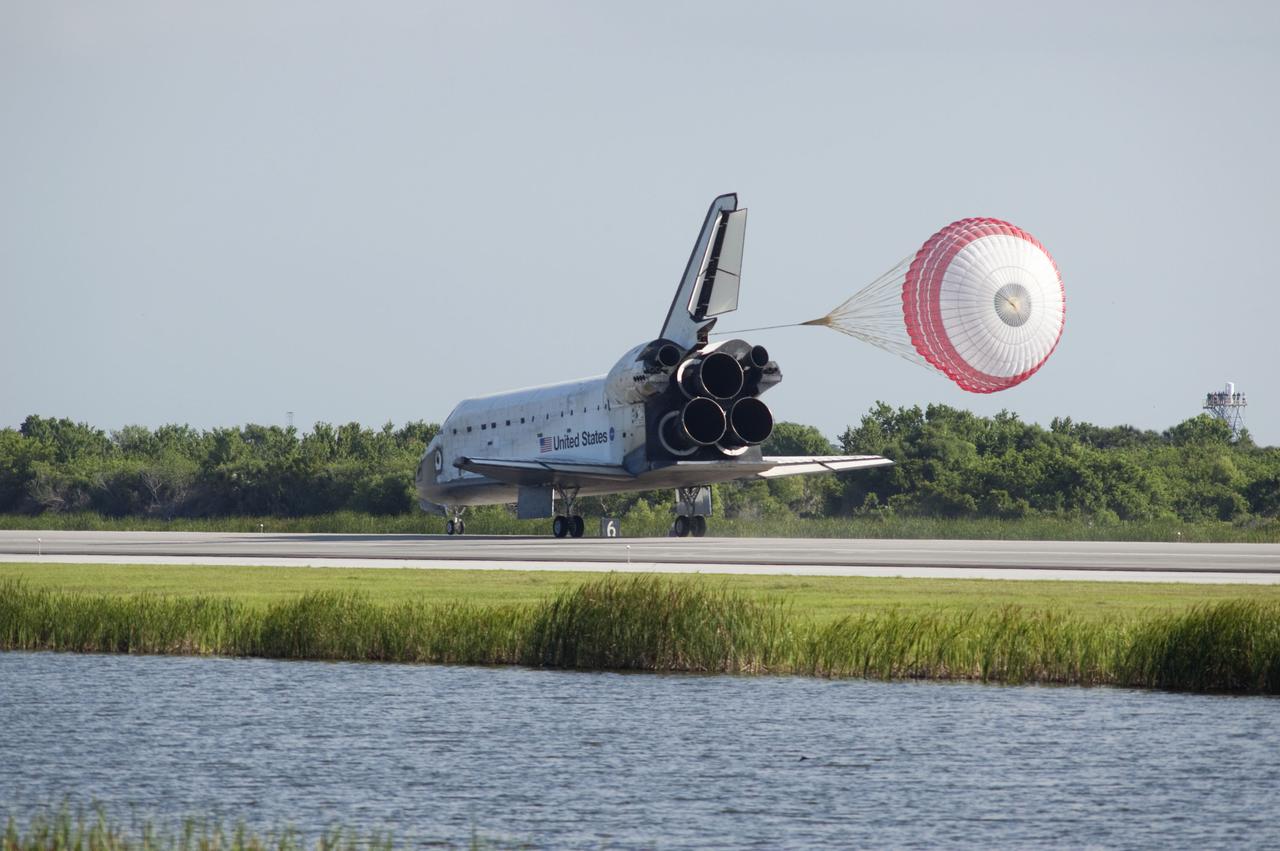 STS132-S-108 (26 May 2010) --- Space shuttle Atlantis? drag chute is deployed as the spacecraft rolls toward wheels stop on Runway 33 at the Shuttle Landing Facility at NASA's Kennedy Space Center in Florida. Landing was at 8:48 a.m. (EDT) on May 26, 2010, completing the 12-day STS-132 mission to the International Space Station. Main gear touchdown was at 8:48:11 a.m., followed by nose gear touchdown at 8:48:21 a.m. and wheelstop at 8:49:18 a.m. Onboard are NASA astronauts Ken Ham, commander; Tony Antonelli, pilot; Garrett Reisman, Michael Good, Steve Bowen and Piers Sellers, all mission specialists. The six-member STS-132 crew carried the Russian-built Mini Research Module 1 (MRM1) to the orbital complex. STS-132 is the 34th shuttle mission to the station, the 132nd shuttle mission overall and the last planned flight for Atlantis.