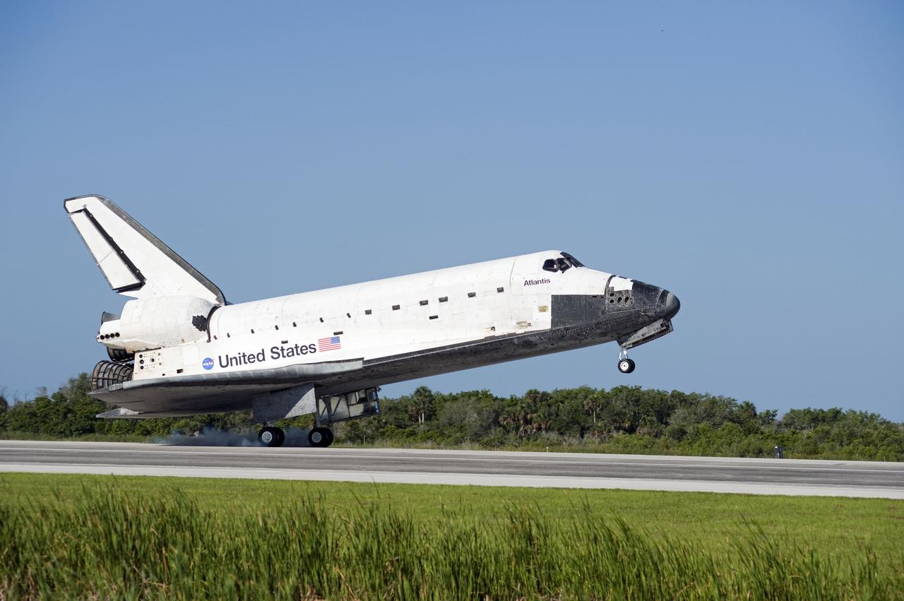STS132-S-109 (26 May 2010) --- Space shuttle Atlantis' main gear touches down on Runway 33 at the Shuttle Landing Facility at NASA's Kennedy Space Center in Florida. Landing was at 8:48 a.m. (EDT) on May 26, 2010, completing the 12-day STS-132 mission to the International Space Station. Main gear touchdown was at 8:48:11 a.m., followed by nose gear touchdown at 8:48:21 a.m. and wheelstop at 8:49:18 a.m. Onboard are NASA astronauts Ken Ham, commander; Tony Antonelli, pilot; Garrett Reisman, Michael Good, Steve Bowen and Piers Sellers, all mission specialists. The six-member STS-132 crew carried the Russian-built Mini Research Module 1 (MRM1) to the orbital complex. STS-132 is the 34th shuttle mission to the station, the 132nd shuttle mission overall and the last planned flight for Atlantis.