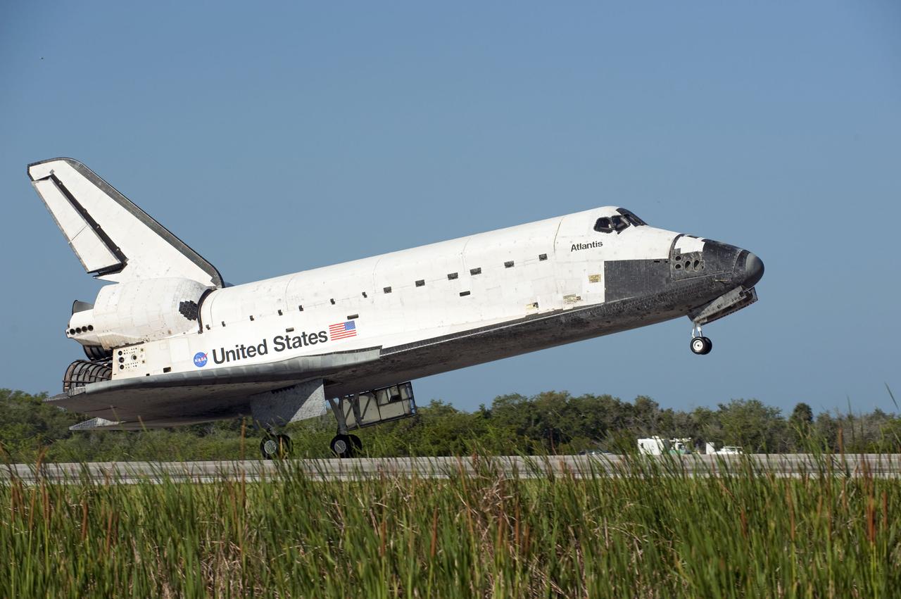 STS132-S-120 (26 May 2010) --- Space shuttle Atlantis' main gear touches down on Runway 33 at the Shuttle Landing Facility at NASA's Kennedy Space Center in Florida. Landing was at 8:48 a.m. (EDT) on May 26, 2010, completing the 12-day STS-132 mission to the International Space Station. Main gear touchdown was at 8:48:11 a.m., followed by nose gear touchdown at 8:48:21 a.m. and wheelstop at 8:49:18 a.m. Onboard are NASA astronauts Ken Ham, commander; Tony Antonelli, pilot; Garrett Reisman, Michael Good, Steve Bowen and Piers Sellers, all mission specialists. The six-member STS-132 crew carried the Russian-built Mini Research Module 1 (MRM1) to the orbital complex. STS-132 is the 34th shuttle mission to the station, the 132nd shuttle mission overall and the last planned flight for Atlantis.