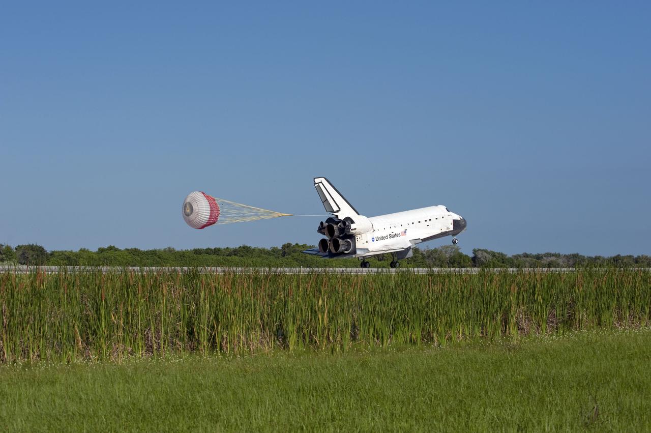 STS132-S-121 (26 May 2010) --- Space shuttle Atlantis? drag chute is deployed as the spacecraft rolls toward wheels stop on Runway 33 at the Shuttle Landing Facility at NASA's Kennedy Space Center in Florida. Landing was at 8:48 a.m. (EDT) on May 26, 2010, completing the 12-day STS-132 mission to the International Space Station. Main gear touchdown was at 8:48:11 a.m., followed by nose gear touchdown at 8:48:21 a.m. and wheelstop at 8:49:18 a.m. Onboard are NASA astronauts Ken Ham, commander; Tony Antonelli, pilot; Garrett Reisman, Michael Good, Steve Bowen and Piers Sellers, all mission specialists. The six-member STS-132 crew carried the Russian-built Mini Research Module 1 (MRM1) to the orbital complex. STS-132 is the 34th shuttle mission to the station, the 132nd shuttle mission overall and the last planned flight for Atlantis.