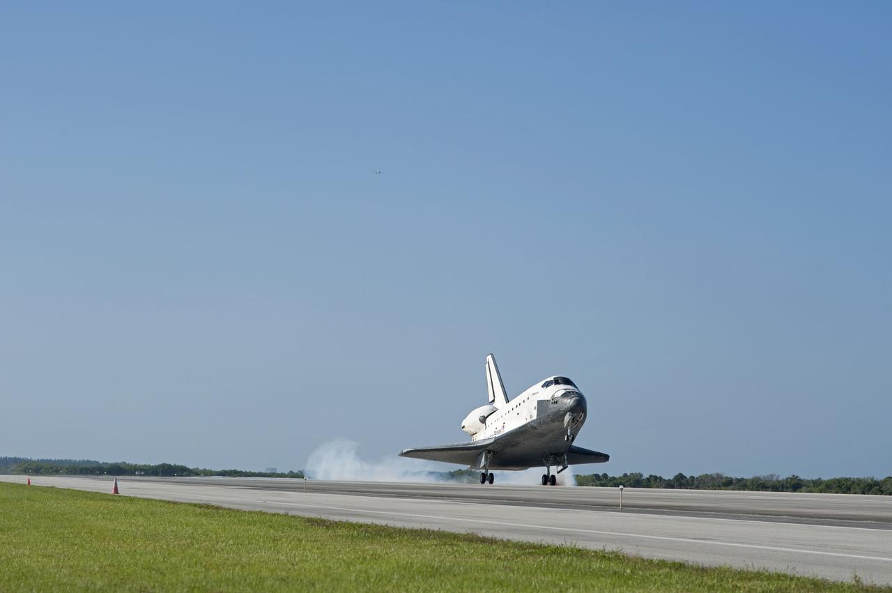 STS132-S-125 (26 May 2010) --- Space shuttle Atlantis' main gear touches down on Runway 33 at the Shuttle Landing Facility at NASA's Kennedy Space Center in Florida. Landing was at 8:48 a.m. (EDT) on May 26, 2010, completing the 12-day STS-132 mission to the International Space Station. Main gear touchdown was at 8:48:11 a.m., followed by nose gear touchdown at 8:48:21 a.m. and wheelstop at 8:49:18 a.m. Onboard are NASA astronauts Ken Ham, commander; Tony Antonelli, pilot; Garrett Reisman, Michael Good, Steve Bowen and Piers Sellers, all mission specialists. The six-member STS-132 crew carried the Russian-built Mini Research Module 1 (MRM1) to the orbital complex. STS-132 is the 34th shuttle mission to the station, the 132nd shuttle mission overall and the last planned flight for Atlantis.