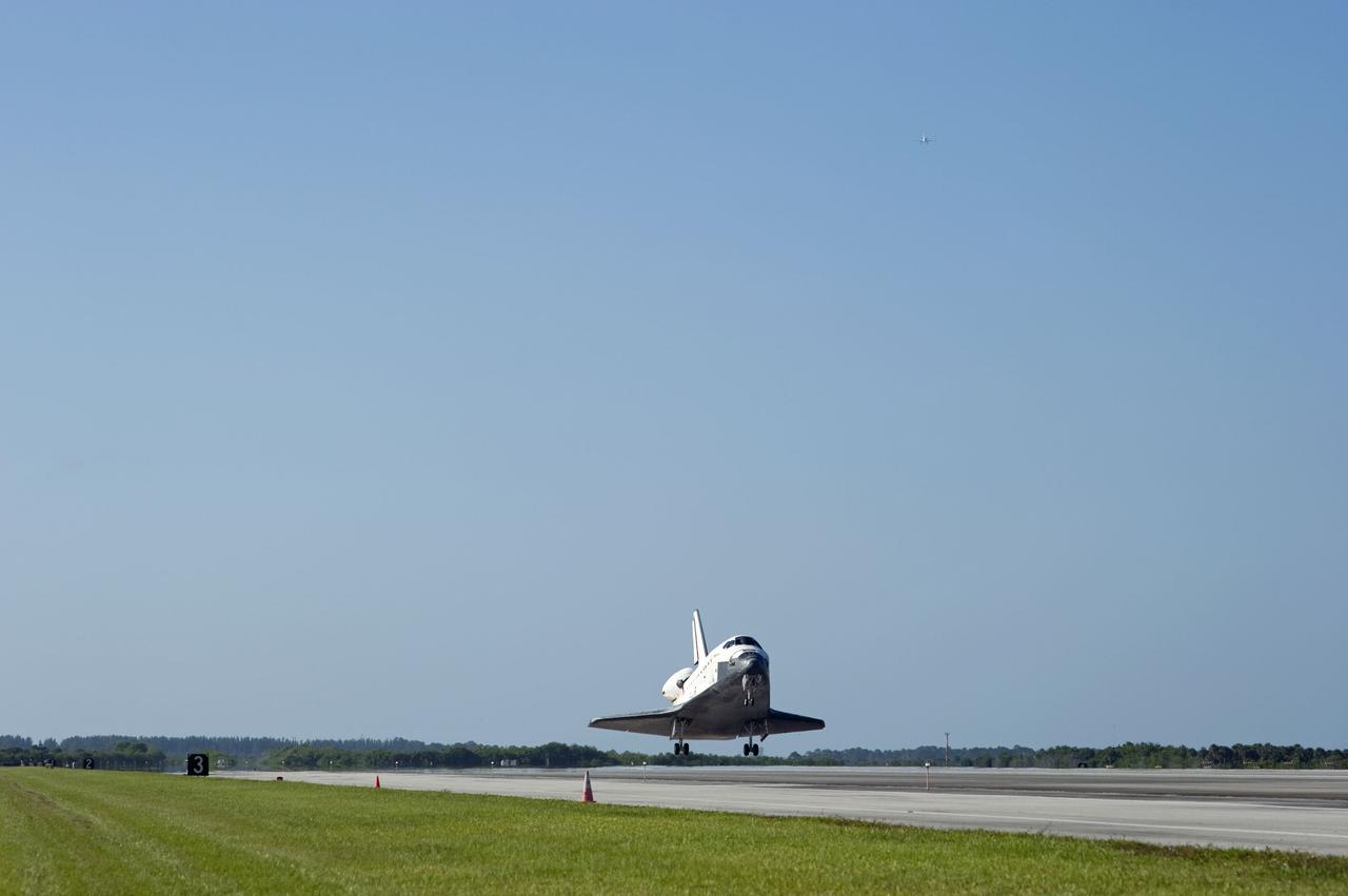 STS132-S-127 (26 May 2010) --- Space shuttle Atlantis nears touchdown on Runway 33 at the Shuttle Landing Facility at NASA's Kennedy Space Center in Florida. Landing was at 8:48 a.m. (EDT) on May 26, 2010, completing the 12-day STS-132 mission to the International Space Station. Main gear touchdown was at 8:48:11 a.m., followed by nose gear touchdown at 8:48:21 a.m. and wheelstop at 8:49:18 a.m. Onboard are NASA astronauts Ken Ham, commander; Tony Antonelli, pilot; Garrett Reisman, Michael Good, Steve Bowen and Piers Sellers, all mission specialists. The six-member STS-132 crew carried the Russian-built Mini Research Module 1 (MRM1) to the orbital complex. STS-132 is the 34th shuttle mission to the station, the 132nd shuttle mission overall and the last planned flight for Atlantis.