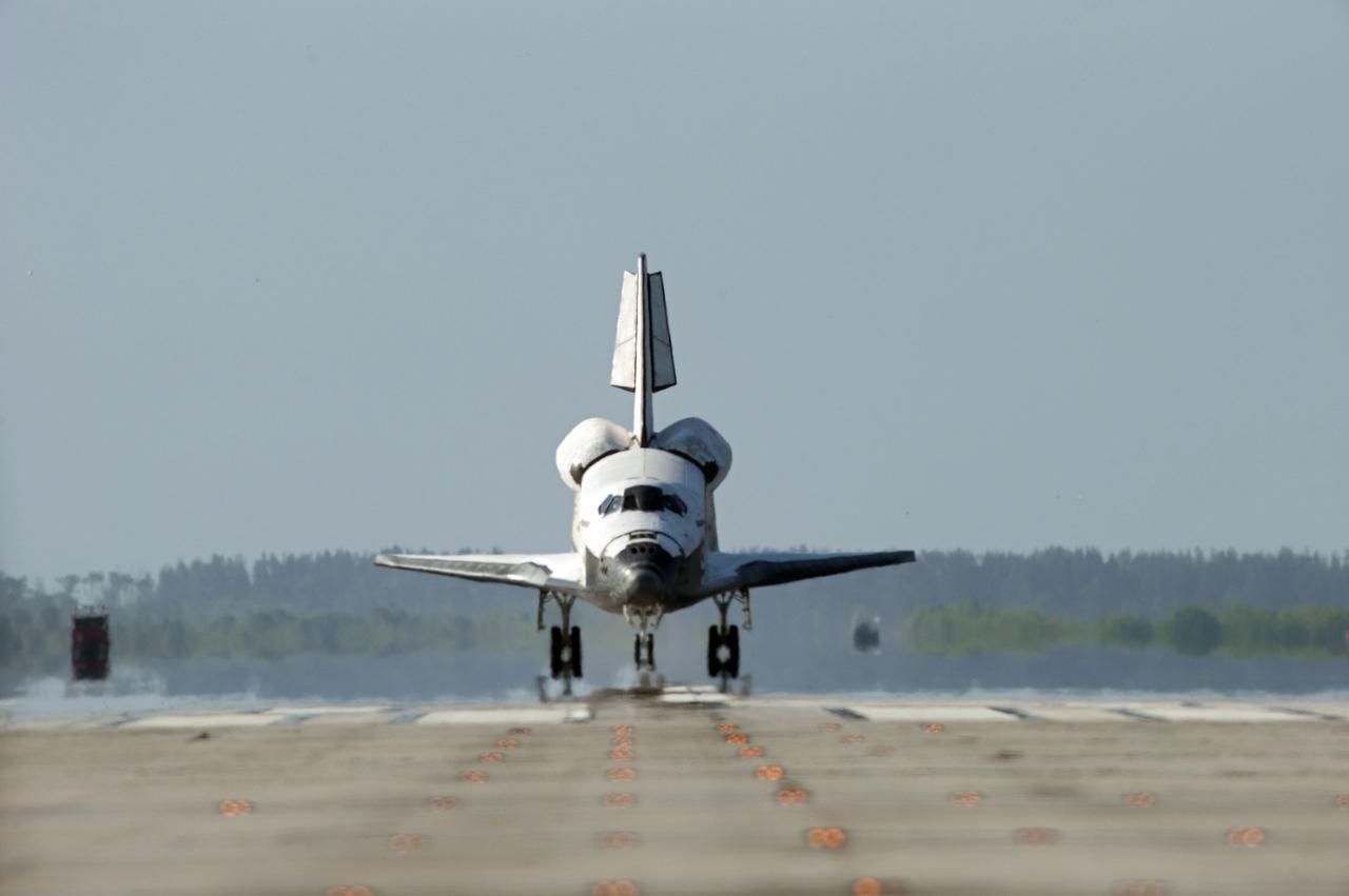 STS132-S-134 (26 May 2010) --- Space shuttle Atlantis rolls down Runway 33 at the Shuttle Landing Facility at NASA's Kennedy Space Center in Florida. Landing was at 8:48 a.m. (EDT) on May 26, 2010, completing the 12-day STS-132 mission to the International Space Station. Main gear touchdown was at 8:48:11 a.m., followed by nose gear touchdown at 8:48:21 a.m. and wheelstop at 8:49:18 a.m. Onboard are NASA astronauts Ken Ham, commander; Tony Antonelli, pilot; Garrett Reisman, Michael Good, Steve Bowen and Piers Sellers, all mission specialists. The six-member STS-132 crew carried the Russian-built Mini Research Module 1 (MRM1) to the orbital complex. STS-132 is the 34th shuttle mission to the station, the 132nd shuttle mission overall and the last planned flight for Atlantis.