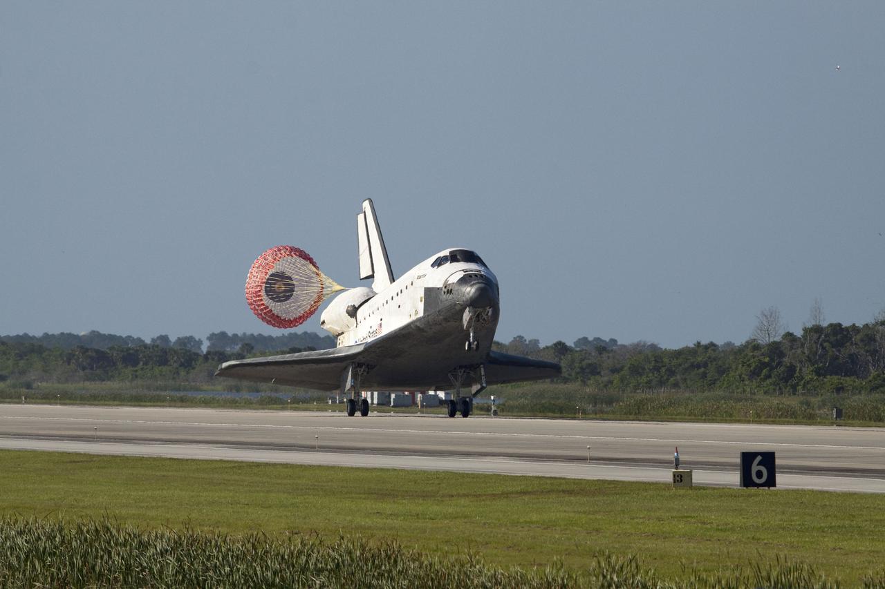 STS132-S-141 (26 May 2010) --- Space shuttle Atlantis? drag chute is deployed as the spacecraft rolls toward wheels stop on Runway 33 at the Shuttle Landing Facility at NASA's Kennedy Space Center in Florida. Landing was at 8:48 a.m. (EDT) on May 26, 2010, completing the 12-day STS-132 mission to the International Space Station. Main gear touchdown was at 8:48:11 a.m., followed by nose gear touchdown at 8:48:21 a.m. and wheelstop at 8:49:18 a.m. Onboard are NASA astronauts Ken Ham, commander; Tony Antonelli, pilot; Garrett Reisman, Michael Good, Steve Bowen and Piers Sellers, all mission specialists. The six-member STS-132 crew carried the Russian-built Mini Research Module 1 (MRM1) to the orbital complex. STS-132 is the 34th shuttle mission to the station, the 132nd shuttle mission overall and the last planned flight for Atlantis.