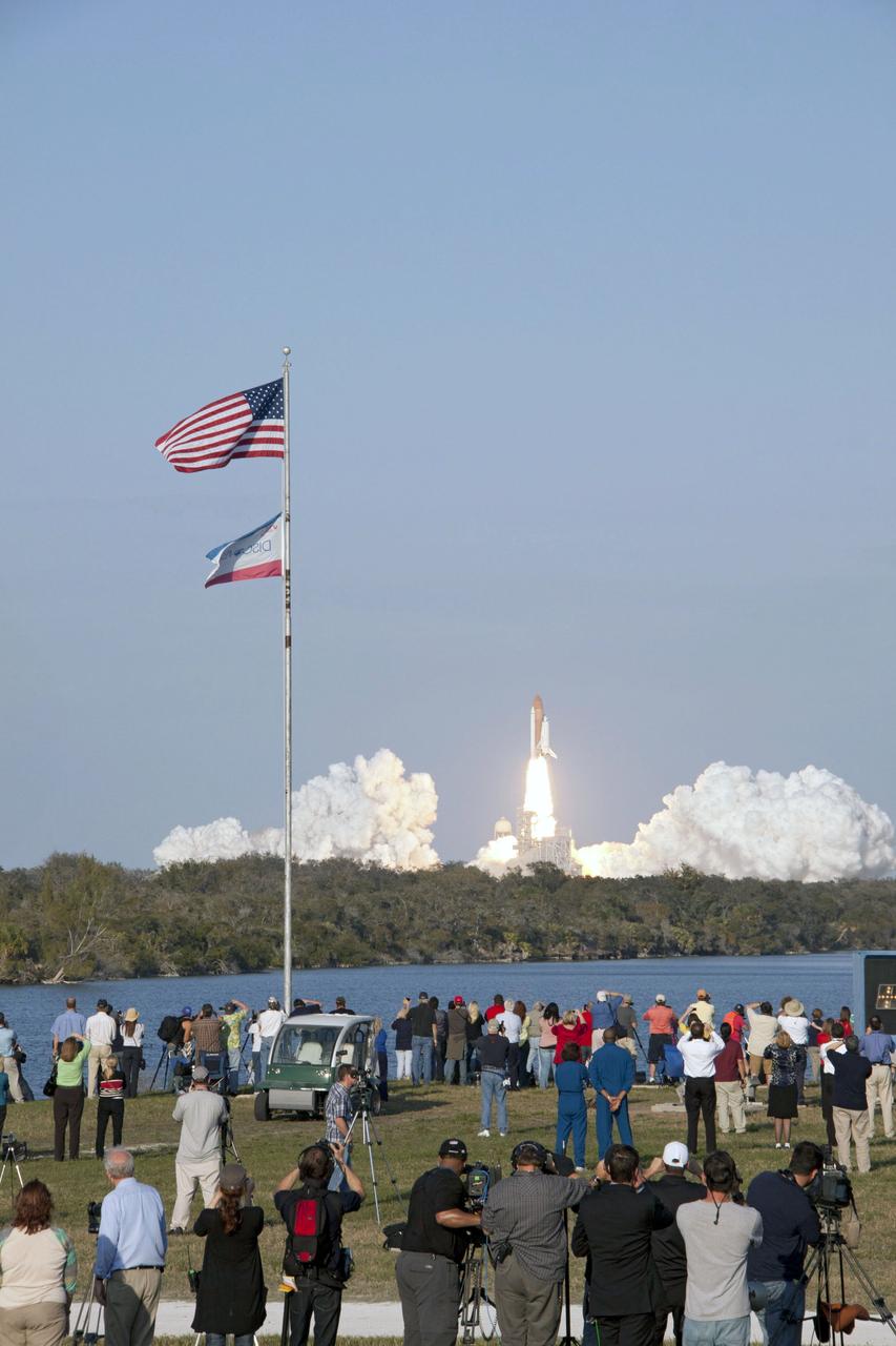 STS133-S-032 (24 Feb. 2011) --- Space shuttle Discovery and its six-member STS-133 crew head toward Earth orbit and rendezvous with the International Space Station. Liftoff was at 4:53 p.m. (EST) on Feb. 24, 2011, from Launch Pad 39A at NASA’s Kennedy Space Center. Onboard are NASA astronauts Steve Lindsey, commander; Eric Boe, pilot; Steve Bowen, Alvin Drew, Michael Barratt and Nicole Stott, all mission specialists. Discovery and its six-member crew are on a mission to deliver the Permanent Multipurpose Module, packed with supplies and critical spare parts, as well as Robonaut 2, the dexterous humanoid astronaut helper, to the International Space Station. Discovery is making its 39th mission and is scheduled to be retired following STS-133. This is the 133rd Space Shuttle Program mission and the 35th shuttle voyage to the space station. Photo credit: NASA or National Aeronautics and Space Administration