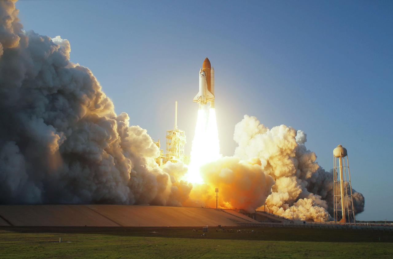 STS133-S-037 (24 Feb. 2011) --- Space shuttle Discovery and its six-member STS-133 crew head toward Earth orbit and rendezvous with the International Space Station. Liftoff was at 4:53 p.m. (EST) on Feb. 24, 2011, from Launch Pad 39A at NASA’s Kennedy Space Center. Onboard are NASA astronauts Steve Lindsey, commander; Eric Boe, pilot; Steve Bowen, Alvin Drew, Michael Barratt and Nicole Stott, all mission specialists. Discovery and its six-member crew are on a mission to deliver the Permanent Multipurpose Module, packed with supplies and critical spare parts, as well as Robonaut 2, the dexterous humanoid astronaut helper, to the International Space Station. Discovery is making its 39th mission and is scheduled to be retired following STS-133. This is the 133rd Space Shuttle Program mission and the 35th shuttle voyage to the space station. Photo credit: NASA or National Aeronautics and Space Administration