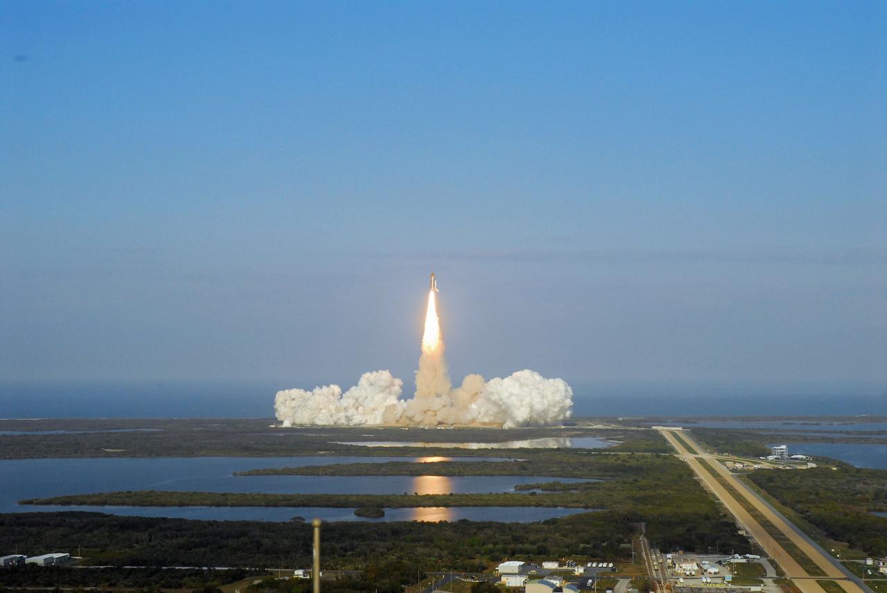STS133-S-054 (24 Feb. 2011) --- Space shuttle Discovery and its six-member STS-133 crew head toward Earth orbit and rendezvous with the International Space Station. Liftoff was at 4:53 p.m. (EST) on Feb. 24, 2011, from Launch Pad 39A at NASA’s Kennedy Space Center. Onboard are NASA astronauts Steve Lindsey, commander; Eric Boe, pilot; Steve Bowen, Alvin Drew, Michael Barratt and Nicole Stott, all mission specialists. Discovery and its six-member crew are on a mission to deliver the Permanent Multipurpose Module, packed with supplies and critical spare parts, as well as Robonaut 2, the dexterous humanoid astronaut helper, to the International Space Station. Discovery is making its 39th mission and is scheduled to be retired following STS-133. This is the 133rd Space Shuttle Program mission and the 35th shuttle voyage to the space station. Photo credit: NASA or National Aeronautics and Space Administration