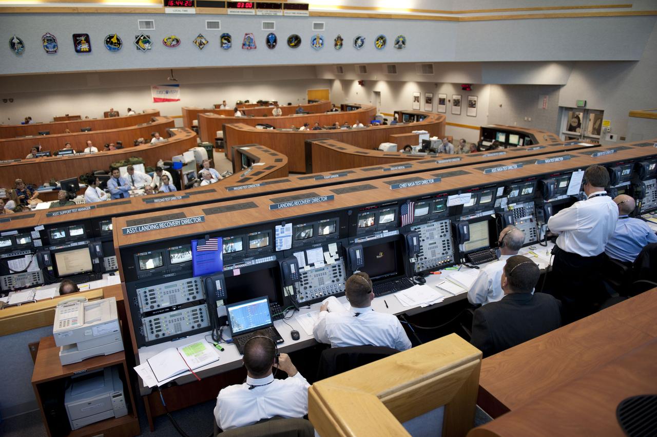STS133-S-064 (24 Feb. 2011) --- In Firing Room 4 of the Launch Control Center at NASA's Kennedy Space Center in Florida, launch controllers monitor the countdown to launch of space shuttle Discovery on its STS-133 mission to the International Space Station. Discovery and its six-member crew are on a mission to deliver the Permanent Multipurpose Module, packed with supplies and critical spare parts, as well as Robonaut 2, the dexterous humanoid astronaut helper, to the orbiting outpost. Discovery is making its 39th mission and is scheduled to be retired following STS-133. This is the 133rd Space Shuttle Program mission and the 35th shuttle voyage to the space station. Photo credit: NASA or National Aeronautics and Space Administration