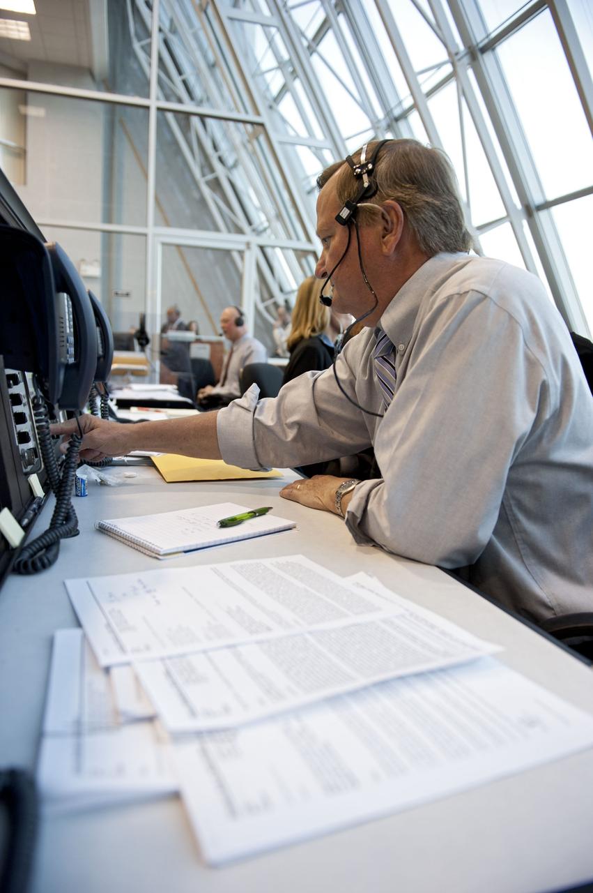 STS133-S-065 (24 Feb. 2011) --- In Firing Room 4 of the Launch Control Center at NASA's Kennedy Space Center in Florida, Shuttle Launch Director Mike Leinbach gives the "go" to launch space shuttle Discovery on its STS-133 mission to the International Space Station. Discovery and its six-member crew are on a mission to deliver the Permanent Multipurpose Module, packed with supplies and critical spare parts, as well as Robonaut 2, the dexterous humanoid astronaut helper, to the orbiting outpost. Discovery is making its 39th mission and is scheduled to be retired following STS-133. This is the 133rd Space Shuttle Program mission and the 35th shuttle voyage to the space station. Photo credit: NASA or National Aeronautics and Space Administration
