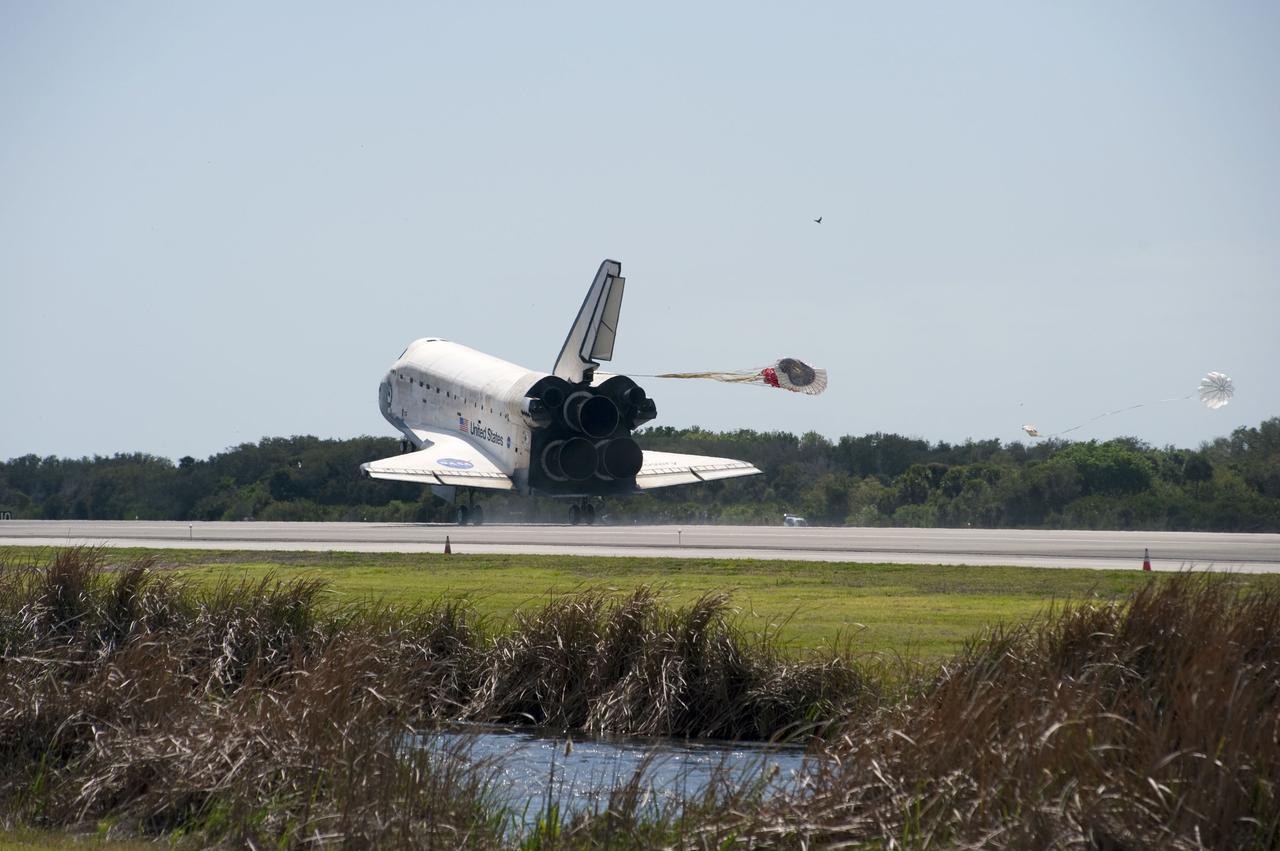 STS133-S-116 (9 March 2011) --- Space shuttle Discovery’s drag chute is deployed as the spacecraft rolls toward wheels stop on Runway 15 at the Shuttle Landing Facility at NASA’s Kennedy Space Center in Florida. Landing was at 11:57 a.m. (EST) on March 9, 2011, completing a more than 12-day STS-133 mission to the International Space Station. Onboard are NASA astronauts Steve Lindsey, commander; Eric Boe, pilot; Steve Bowen, Alvin Drew, Michael Barratt and Nicole Stott, all mission specialists. Discovery and its six-member crew delivered the Permanent Multipurpose Module, packed with supplies and critical spare parts, as well as Robonaut 2, the dexterous humanoid astronaut helper, to the orbiting outpost. STS-133 was Discovery's 39th and final mission. This was the 133rd Space Shuttle Program mission and the 35th shuttle voyage to the space station. Photo credit: NASA or National Aeronautics and Space Administration