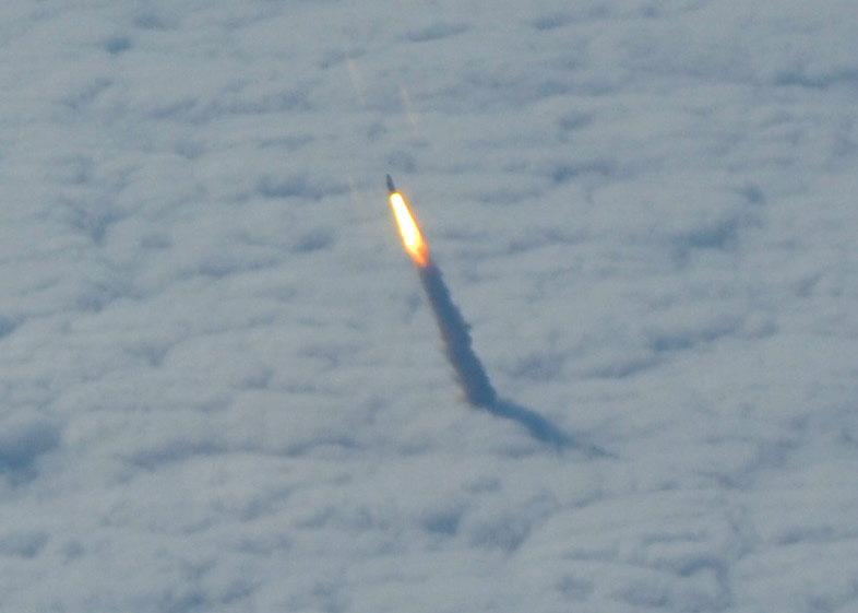 STS134-S-060 (16 May 2011) --- Photographed from a shuttle training aircraft, space shuttle Endeavour and its six-member STS-134 crew head toward Earth orbit and rendezvous with the International Space Station. Liftoff was at 8:56 a.m. (EDT) on May 16, 2011, from Launch Pad 39A at NASA's Kennedy Space Center. Onboard are NASA astronauts Mark Kelly, commander; Greg H. Johnson, pilot; Michael Fincke, Andrew Feustel, Greg Chamitoff and European Space Agency astronaut Roberto Vittori, all mission specialists. STS-134 will deliver the Alpha Magnetic Spectrometer-2 (AMS), Express Logistics Carrier-3, a high-pressure gas tank and additional spare parts for the Dextre robotic helper to the International Space Station. STS-134 is the final spaceflight for Endeavour. Photo credit: NASA