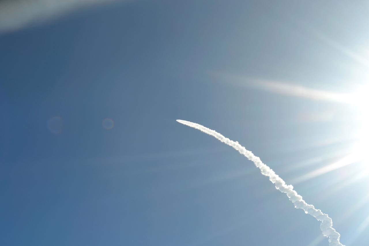 STS134-S-064 (16 May 2011) --- Photographed from a shuttle training aircraft, space shuttle Endeavour and its six-member STS-134 crew head toward Earth orbit and rendezvous with the International Space Station. Liftoff was at 8:56 a.m. (EDT) on May 16, 2011, from Launch Pad 39A at NASA's Kennedy Space Center. Onboard are NASA astronauts Mark Kelly, commander; Greg H. Johnson, pilot; Michael Fincke, Andrew Feustel, Greg Chamitoff and European Space Agency astronaut Roberto Vittori, all mission specialists. STS-134 will deliver the Alpha Magnetic Spectrometer-2 (AMS), Express Logistics Carrier-3, a high-pressure gas tank and additional spare parts for the Dextre robotic helper to the International Space Station. STS-134 is the final spaceflight for Endeavour. Photo credit: NASA