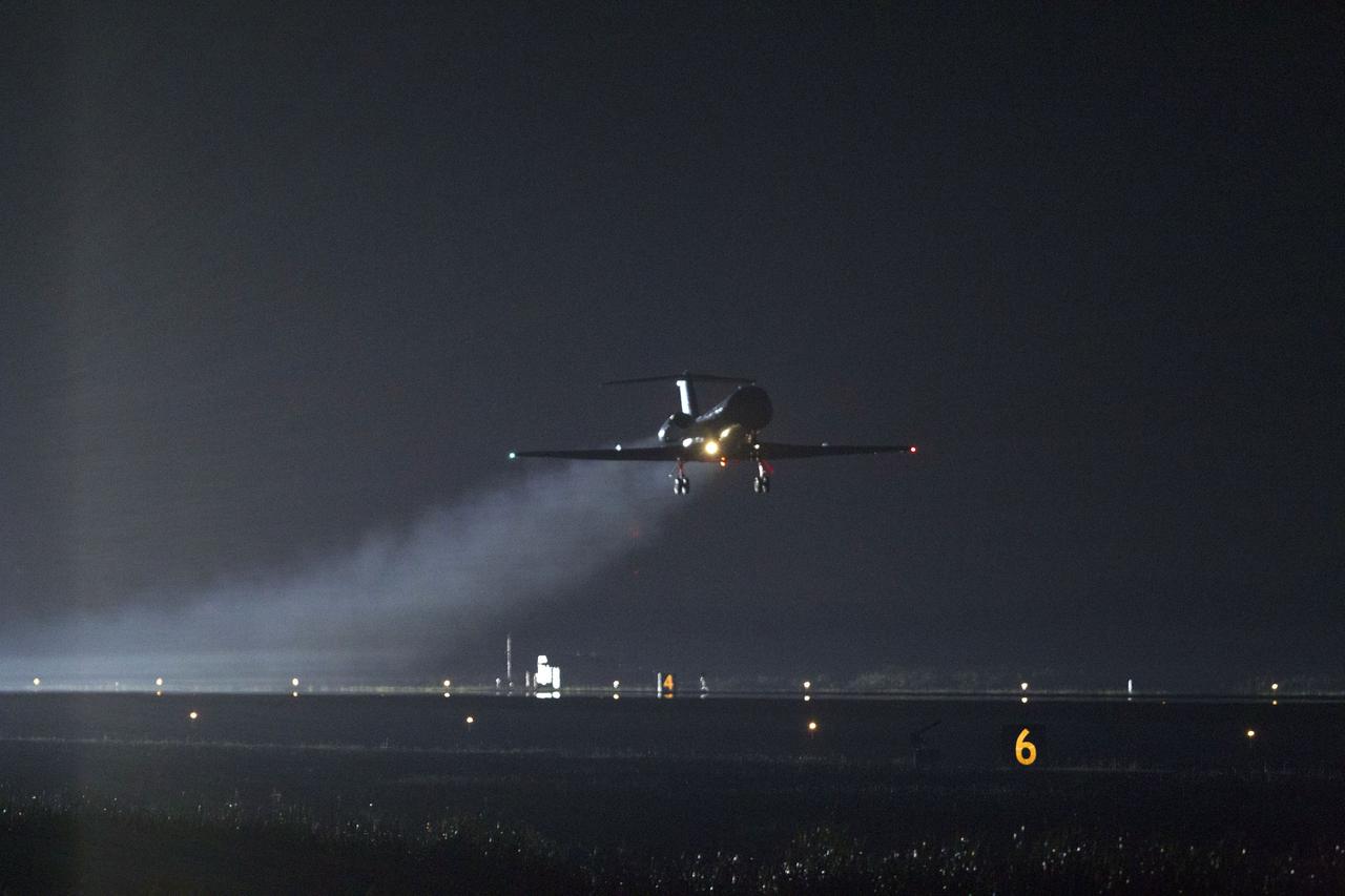 STS134-S-067 (1 June 2011) --- Astronaut Rick Sturckow flies weather reconnaissance in a Shuttle Training Aircraft over NASA's Kennedy Space Center in Florida to assess conditions before space shuttle Endeavour returns to Earth for the final time. Weather was observed "go" and Endeavour glided to a stop on the Shuttle Landing Facility's Runway 15 at 2:35 a.m. EDT, bringing an end to the STS-134 mission. STS-134 delivered the Alpha Magnetic Spectrometer-2 (AMS) and the Express Logistics Carrier-3 (ELC-3) to the International Space Station. AMS will help researchers understand the origin of the universe and search for evidence of dark matter, strange matter and antimatter from the station. ELC-3 carried spare parts that will sustain station operations once the shuttles are retired from service. STS-134 was the 25th and final flight for Endeavour, which has spent 299 days in space, orbited Earth 4,671 times and traveled 122,883,151 miles. Photo credit: NASA