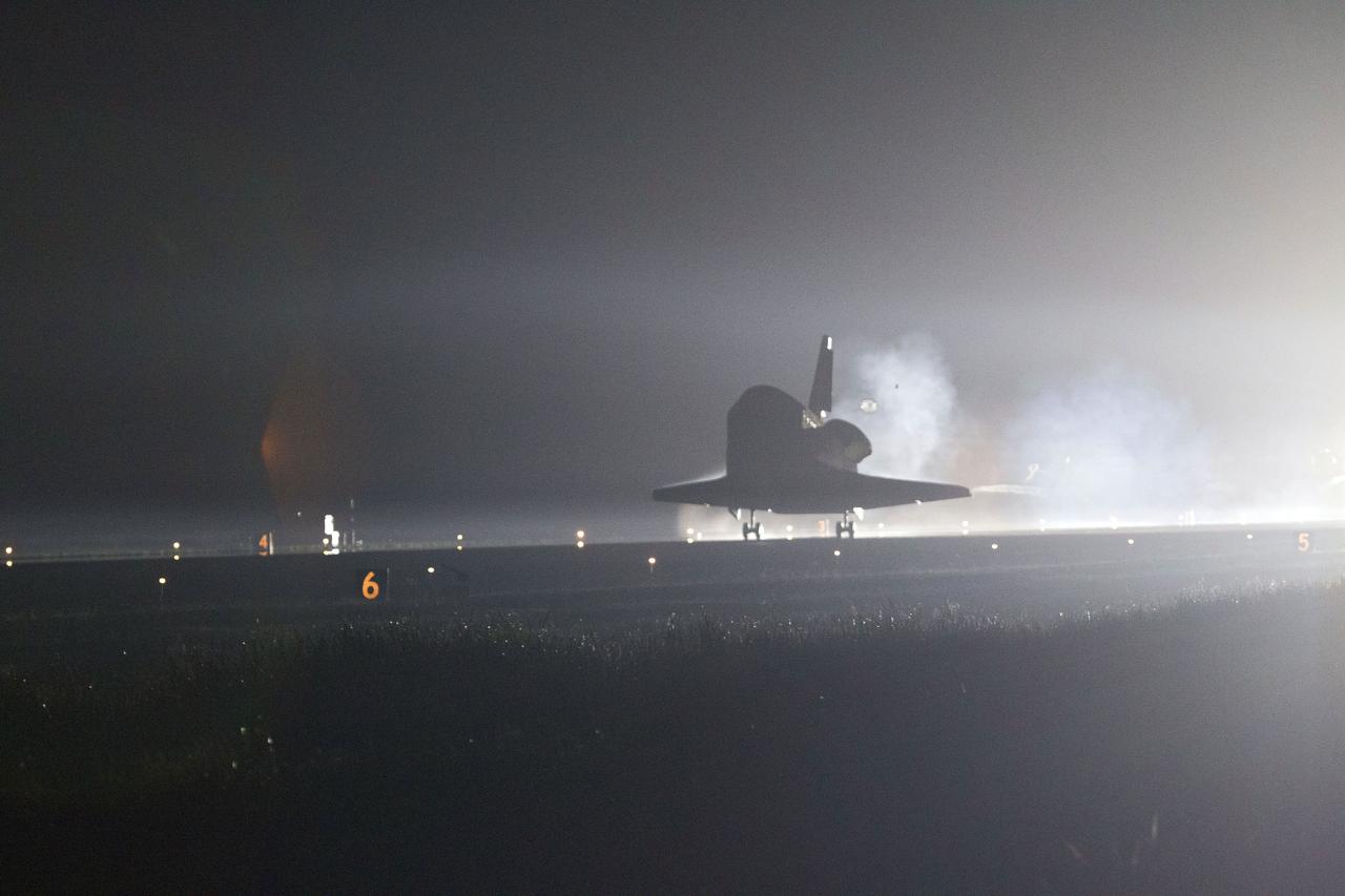 STS134-S-068 (1 June 2011) --- Space shuttle Endeavour lands on Runway 15 on the Shuttle Landing Facility at NASA's Kennedy Space Center in Florida for the final time. Main gear touchdown was at 2:34:51 a.m. (EDT) on June 1, 2011, followed by nose gear touchdown at 2:35:04 a.m., and wheelstop at 2:35:36 a.m. Onboard are NASA astronauts Mark Kelly, STS-134 commander; Greg H. Johnson, pilot; Michael Fincke, Andrew Feustel, Greg Chamitoff and European Space Agency astronaut Roberto Vittori, all mission specialists. STS-134 delivered the Alpha Magnetic Spectrometer-2 (AMS) and the Express Logistics Carrier-3 (ELC-3) to the International Space Station. AMS will help researchers understand the origin of the universe and search for evidence of dark matter, strange matter and antimatter from the station. ELC-3 carried spare parts that will sustain station operations once the shuttles are retired from service. STS-134 was the 25th and final flight for Endeavour, which has spent 299 days in space, orbited Earth 4,671 times and traveled 122,883,151 miles. Photo credit: NASA