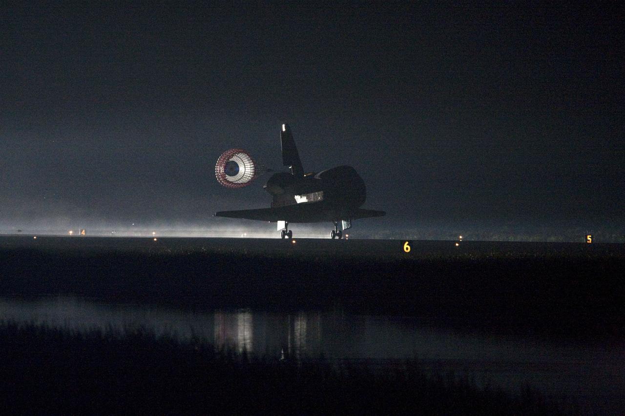 STS134-S-079 (1 June 2011) --- Xenon lights help lead space shuttle Endeavour home to NASA's Kennedy Space Center in Florida. Endeavour landed for the final time on the Shuttle Landing Facility's Runway 15, marking the 24th night landing of NASA's Space Shuttle Program. Main gear touchdown was at 2:34:51 a.m. (EDT) on June 1, 2011, followed by nose gear touchdown at 2:35:04 a.m., and wheelstop at 2:35:36 a.m. Onboard are NASA astronauts Mark Kelly, STS-134 commander; Greg H. Johnson, pilot; Michael Fincke, Andrew Feustel, Greg Chamitoff and European Space Agency astronaut Roberto Vittori, all mission specialists. STS-134 delivered the Alpha Magnetic Spectrometer-2 (AMS) and the Express Logistics Carrier-3 (ELC-3) to the International Space Station. AMS will help researchers understand the origin of the universe and search for evidence of dark matter, strange matter and antimatter from the station. ELC-3 carried spare parts that will sustain station operations once the shuttles are retired from service. STS-134 was the 25th and final flight for Endeavour, which has spent 299 days in space, orbited Earth 4,671 times and traveled 122,883,151 miles. Photo credit: NASA