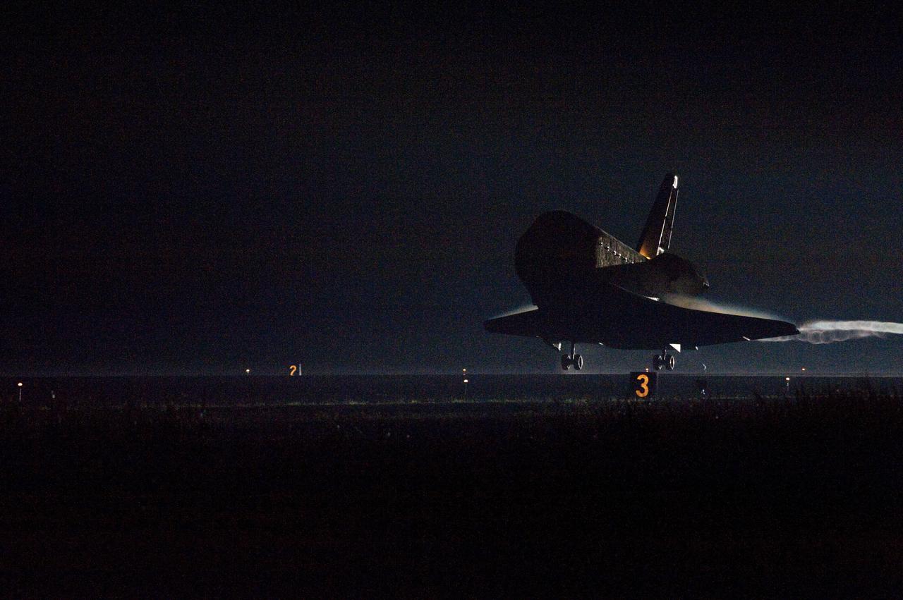 STS134-S-080 (1 June 2011) --- Space shuttle Endeavour lands on Runway 15 on the Shuttle Landing Facility at NASA's Kennedy Space Center in Florida for the final time. Main gear touchdown was at 2:34:51 a.m. (EDT) on June 1, 2011, followed by nose gear touchdown at 2:35:04 a.m., and wheelstop at 2:35:36 a.m. Onboard are NASA astronauts Mark Kelly, STS-134 commander; Greg H. Johnson, pilot; Michael Fincke, Andrew Feustel, Greg Chamitoff and European Space Agency astronaut Roberto Vittori, all mission specialists. STS-134 delivered the Alpha Magnetic Spectrometer-2 (AMS) and the Express Logistics Carrier-3 (ELC-3) to the International Space Station. AMS will help researchers understand the origin of the universe and search for evidence of dark matter, strange matter and antimatter from the station. ELC-3 carried spare parts that will sustain station operations once the shuttles are retired from service. STS-134 was the 25th and final flight for Endeavour, which has spent 299 days in space, orbited Earth 4,671 times and traveled 122,883,151 miles. Photo credit: NASA