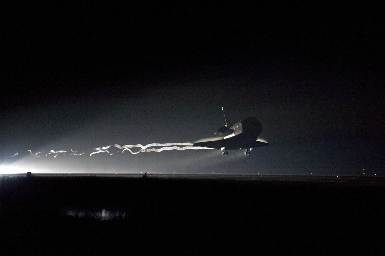 STS134-S-083 (1 June 2011) --- Space shuttle Endeavour approaches Runway 15 on the Shuttle Landing Facility at NASA's Kennedy Space Center in Florida for the final time. Main gear touchdown was at 2:34:51 a.m. (EDT) on June 1, 2011, followed by nose gear touchdown at 2:35:04 a.m., and wheelstop at 2:35:36 a.m. Onboard are NASA astronauts Mark Kelly, STS-134 commander; Greg H. Johnson, pilot; Michael Fincke, Andrew Feustel, Greg Chamitoff and European Space Agency astronaut Roberto Vittori, all mission specialists. STS-134 delivered the Alpha Magnetic Spectrometer-2 (AMS) and the Express Logistics Carrier-3 (ELC-3) to the International Space Station. AMS will help researchers understand the origin of the universe and search for evidence of dark matter, strange matter and antimatter from the station. ELC-3 carried spare parts that will sustain station operations once the shuttles are retired from service. STS-134 was the 25th and final flight for Endeavour, which has spent 299 days in space, orbited Earth 4,671 times and traveled 122,883,151 miles. Photo credit: NASA