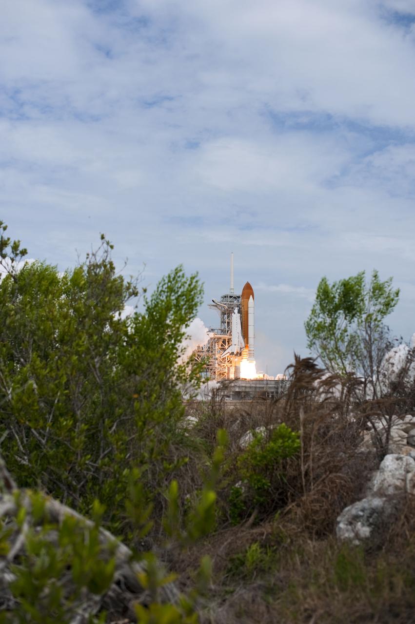 STS135-S-069 (8 July 2011) --- Space shuttle Atlantis and its four-member STS-135 crew head toward Earth orbit and rendezvous with the International Space Station. Liftoff was at 11:29 a.m. (EDT) on July 8, 2011 from Launch Pad 39A at NASA's Kennedy Space Center. Onboard are NASA astronauts Chris Ferguson, commander; Doug Hurley, pilot; Sandy Magnus and Rex Walheim, both mission specialists. STS-135 will deliver the Raffaello multi-purpose logistics module packed with supplies and spare parts for the space station. Atlantis also carries the Robotic Refueling Mission experiment that will investigate the potential for robotically refueling existing satellites in orbit. In addition, Atlantis will return with a failed ammonia pump module to help NASA better understand the failure mechanism and improve pump designs for future systems. STS-135 will be the 33rd flight of Atlantis, the 37th shuttle mission to the space station, and the 135th and final mission of NASA's Space Shuttle Program. Photo credit: NASA
