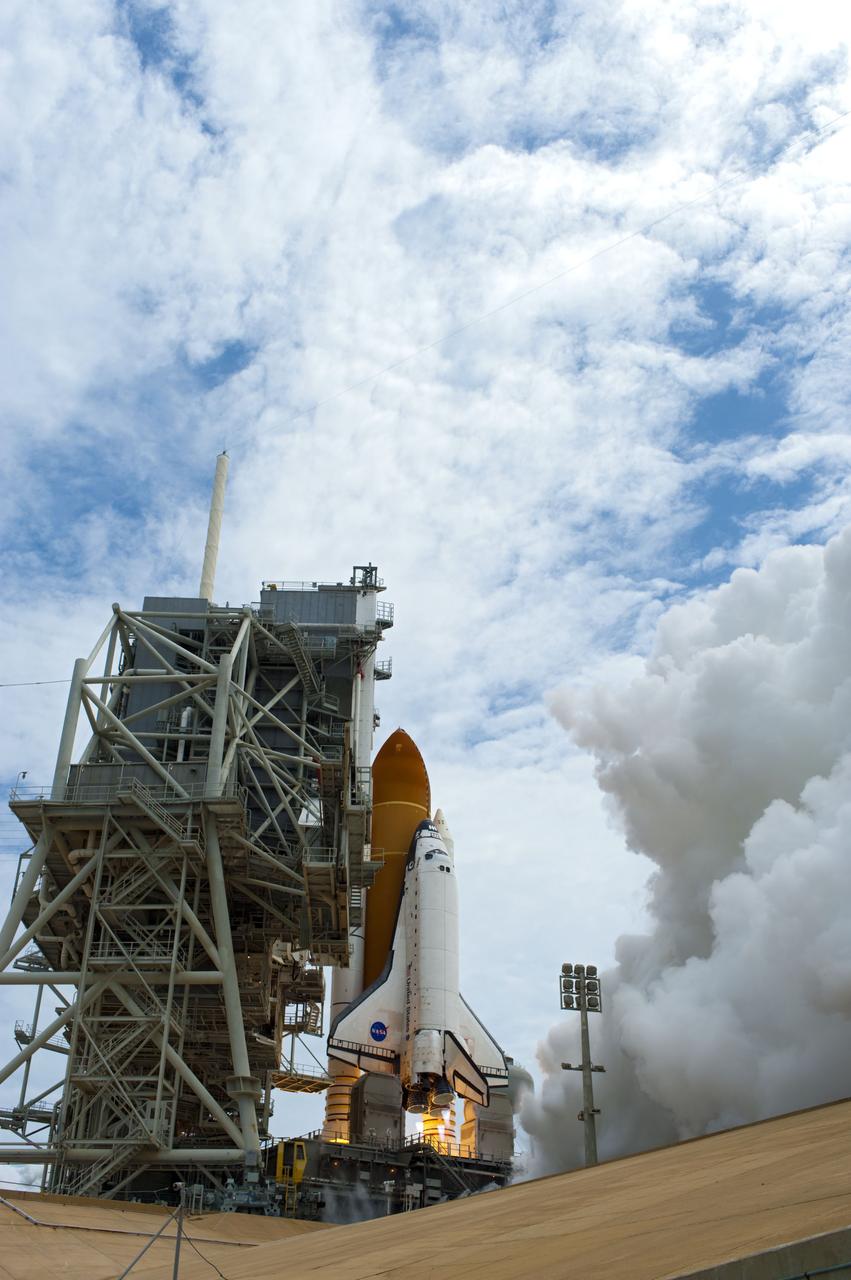 STS135-S-072 (8 July 2011) --- At NASA's Kennedy Space Center in Florida, space shuttle Atlantis' main engines and solid rocket boosters ignite on Launch Pad 39A leaving behind a billow of steam as it lifts off on its STS-135 mission to the International Space Station. Onboard are NASA astronauts Chris Ferguson, commander; Doug Hurley, pilot; Sandy Magnus and Rex Walheim, both mission specialists. STS-135 will deliver the Raffaello multi-purpose logistics module packed with supplies and spare parts for the space station. Atlantis also carries the Robotic Refueling Mission experiment that will investigate the potential for robotically refueling existing satellites in orbit. In addition, Atlantis will return with a failed ammonia pump module to help NASA better understand the failure mechanism and improve pump designs for future systems. STS-135 will be the 33rd flight of Atlantis, the 37th shuttle mission to the space station, and the 135th and final mission of NASA's Space Shuttle Program. Photo credit: NASA