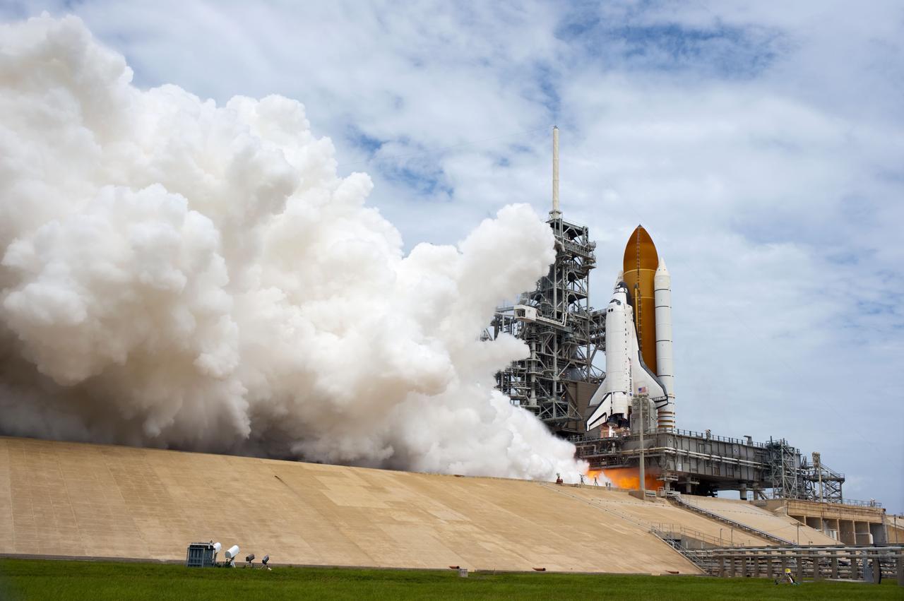 STS135-S-080 (8 July 2011) --- At NASA's Kennedy Space Center in Florida, space shuttle Atlantis' main engines and solid rocket boosters ignite on Launch Pad 39A leaving behind a billow of steam as it lifts off on its STS-135 mission to the International Space Station. Onboard are NASA astronauts Chris Ferguson, commander; Doug Hurley, pilot; Sandy Magnus and Rex Walheim, both mission specialists. STS-135 will deliver the Raffaello multi-purpose logistics module packed with supplies and spare parts for the space station. Atlantis also carries the Robotic Refueling Mission experiment that will investigate the potential for robotically refueling existing satellites in orbit. In addition, Atlantis will return with a failed ammonia pump module to help NASA better understand the failure mechanism and improve pump designs for future systems. STS-135 will be the 33rd flight of Atlantis, the 37th shuttle mission to the space station, and the 135th and final mission of NASA's Space Shuttle Program. Photo credit: NASA