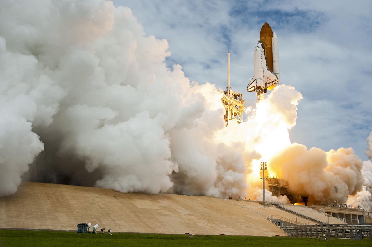 STS135-S-082 (8 July 2011) --- Space shuttle Atlantis and its four-member STS-135 crew head toward Earth orbit and rendezvous with the International Space Station. Liftoff was at 11:29 a.m. (EDT) on July 8, 2011 from Launch Pad 39A at NASA's Kennedy Space Center. Onboard are NASA astronauts Chris Ferguson, commander; Doug Hurley, pilot; Sandy Magnus and Rex Walheim, both mission specialists. STS-135 will deliver the Raffaello multi-purpose logistics module packed with supplies and spare parts for the space station. Atlantis also carries the Robotic Refueling Mission experiment that will investigate the potential for robotically refueling existing satellites in orbit. In addition, Atlantis will return with a failed ammonia pump module to help NASA better understand the failure mechanism and improve pump designs for future systems. STS-135 will be the 33rd flight of Atlantis, the 37th shuttle mission to the space station, and the 135th and final mission of NASA's Space Shuttle Program. Photo credit: NASA