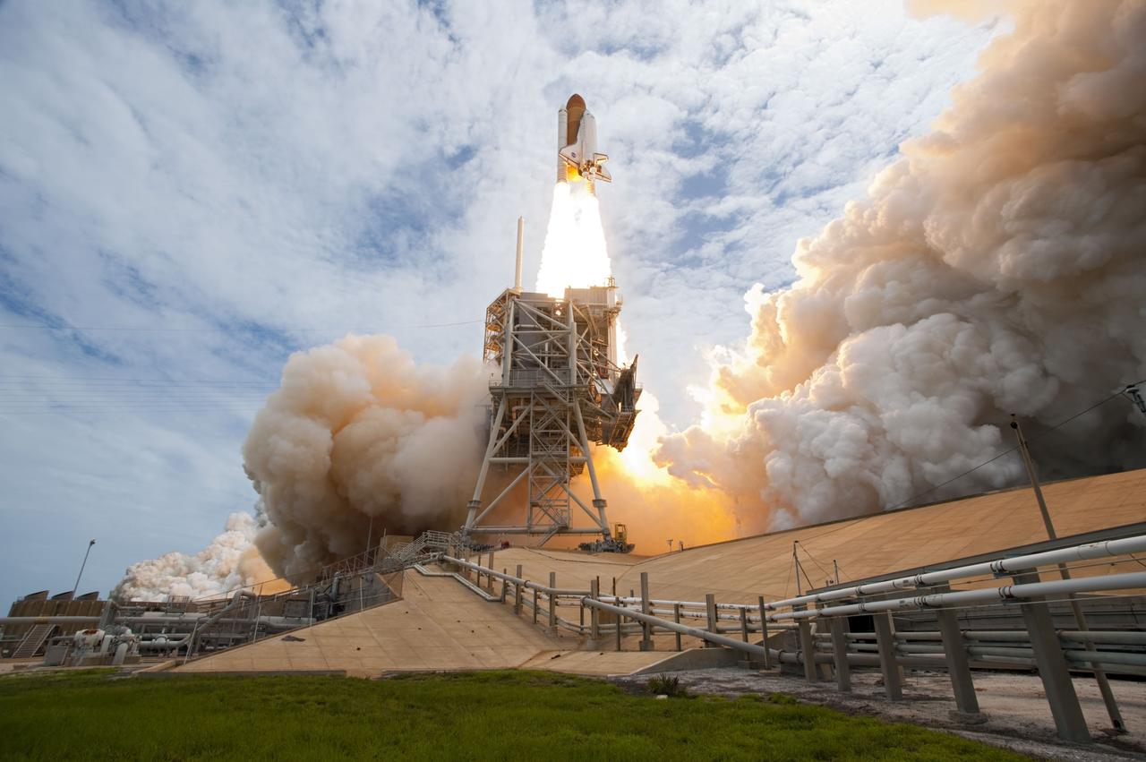 STS135-S-085 (8 July 2011) --- Space shuttle Atlantis and its four-member STS-135 crew head toward Earth orbit and rendezvous with the International Space Station. Liftoff was at 11:29 a.m. (EDT) on July 8, 2011 from Launch Pad 39A at NASA's Kennedy Space Center. Onboard are NASA astronauts Chris Ferguson, commander; Doug Hurley, pilot; Sandy Magnus and Rex Walheim, both mission specialists. STS-135 will deliver the Raffaello multi-purpose logistics module packed with supplies and spare parts for the space station. Atlantis also carries the Robotic Refueling Mission experiment that will investigate the potential for robotically refueling existing satellites in orbit. In addition, Atlantis will return with a failed ammonia pump module to help NASA better understand the failure mechanism and improve pump designs for future systems. STS-135 will be the 33rd flight of Atlantis, the 37th shuttle mission to the space station, and the 135th and final mission of NASA's Space Shuttle Program. Photo credit: NASA