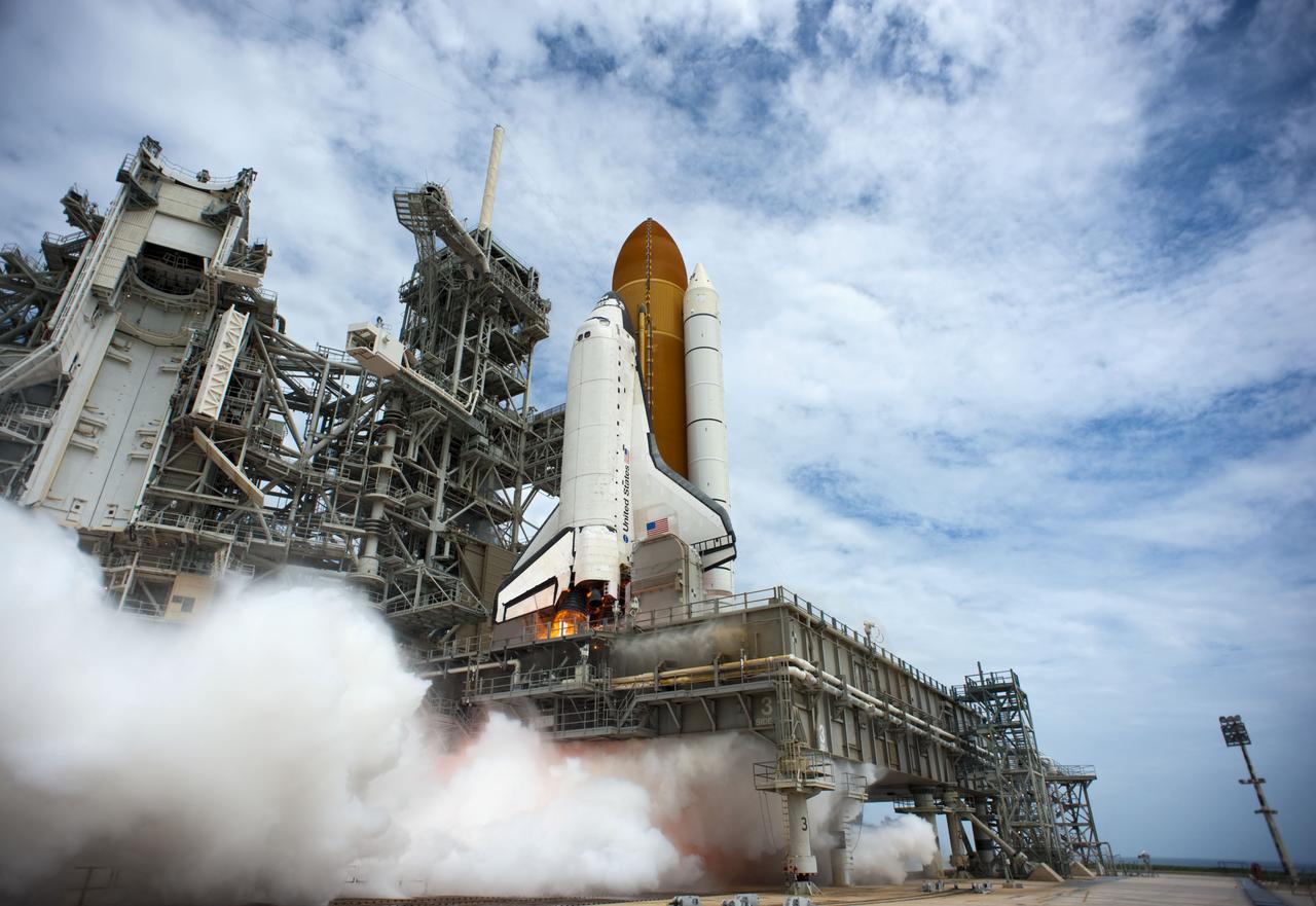 STS135-S-088 (8 July 2011) --- At NASA's Kennedy Space Center in Florida, space shuttle Atlantis' main engines and solid rocket boosters ignite on Launch Pad 39A leaving behind a billow of steam as it lifts off on its STS-135 mission to the International Space Station. Onboard are NASA astronauts Chris Ferguson, commander; Doug Hurley, pilot; Sandy Magnus and Rex Walheim, both mission specialists. STS-135 will deliver the Raffaello multi-purpose logistics module packed with supplies and spare parts for the space station. Atlantis also carries the Robotic Refueling Mission experiment that will investigate the potential for robotically refueling existing satellites in orbit. In addition, Atlantis will return with a failed ammonia pump module to help NASA better understand the failure mechanism and improve pump designs for future systems. STS-135 will be the 33rd flight of Atlantis, the 37th shuttle mission to the space station, and the 135th and final mission of NASA's Space Shuttle Program. Photo credit: NASA