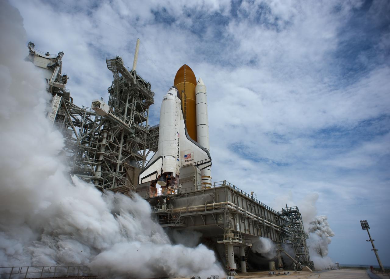 STS135-S-089 (8 July 2011) --- At NASA's Kennedy Space Center in Florida, space shuttle Atlantis' main engines and solid rocket boosters ignite on Launch Pad 39A leaving behind a billow of steam as it lifts off on its STS-135 mission to the International Space Station. Onboard are NASA astronauts Chris Ferguson, commander; Doug Hurley, pilot; Sandy Magnus and Rex Walheim, both mission specialists. STS-135 will deliver the Raffaello multi-purpose logistics module packed with supplies and spare parts for the space station. Atlantis also carries the Robotic Refueling Mission experiment that will investigate the potential for robotically refueling existing satellites in orbit. In addition, Atlantis will return with a failed ammonia pump module to help NASA better understand the failure mechanism and improve pump designs for future systems. STS-135 will be the 33rd flight of Atlantis, the 37th shuttle mission to the space station, and the 135th and final mission of NASA's Space Shuttle Program. Photo credit: NASA