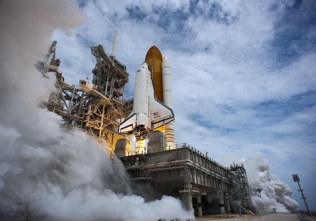 STS135-S-090 (8 July 2011) --- Space shuttle Atlantis and its four-member STS-135 crew head toward Earth orbit and rendezvous with the International Space Station. Liftoff was at 11:29 a.m. (EDT) on July 8, 2011 from Launch Pad 39A at NASA's Kennedy Space Center. Onboard are NASA astronauts Chris Ferguson, commander; Doug Hurley, pilot; Sandy Magnus and Rex Walheim, both mission specialists. STS-135 will deliver the Raffaello multi-purpose logistics module packed with supplies and spare parts for the space station. Atlantis also carries the Robotic Refueling Mission experiment that will investigate the potential for robotically refueling existing satellites in orbit. In addition, Atlantis will return with a failed ammonia pump module to help NASA better understand the failure mechanism and improve pump designs for future systems. STS-135 will be the 33rd flight of Atlantis, the 37th shuttle mission to the space station, and the 135th and final mission of NASA's Space Shuttle Program. Photo credit: NASA