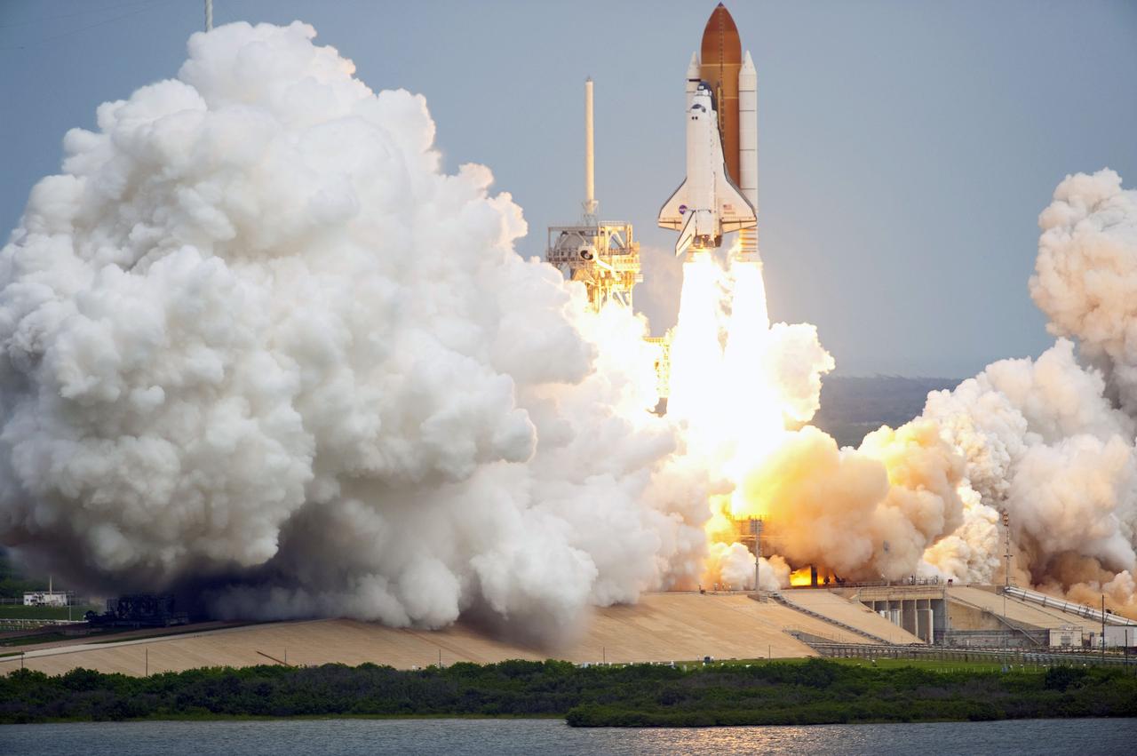 STS135-S-108 (8 July 2011) --- Space shuttle Atlantis and its four-member STS-135 crew head toward Earth orbit and rendezvous with the International Space Station. Liftoff was at 11:29 a.m. (EDT) on July 8, 2011 from Launch Pad 39A at NASA's Kennedy Space Center. Onboard are NASA astronauts Chris Ferguson, commander; Doug Hurley, pilot; Sandy Magnus and Rex Walheim, both mission specialists. STS-135 will deliver the Raffaello multi-purpose logistics module packed with supplies and spare parts for the space station. Atlantis also carries the Robotic Refueling Mission experiment that will investigate the potential for robotically refueling existing satellites in orbit. In addition, Atlantis will return with a failed ammonia pump module to help NASA better understand the failure mechanism and improve pump designs for future systems. STS-135 will be the 33rd flight of Atlantis, the 37th shuttle mission to the space station, and the 135th and final mission of NASA's Space Shuttle Program. Photo credit: NASA