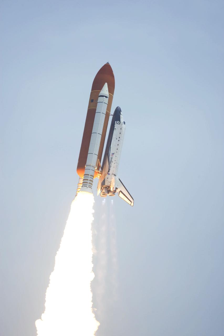 STS135-S-113 (8 July 2011) --- Space shuttle Atlantis and its four-member STS-135 crew head toward Earth orbit and rendezvous with the International Space Station. Liftoff was at 11:29 a.m. (EDT) on July 8, 2011 from Launch Pad 39A at NASA's Kennedy Space Center. Onboard are NASA astronauts Chris Ferguson, commander; Doug Hurley, pilot; Sandy Magnus and Rex Walheim, both mission specialists. STS-135 will deliver the Raffaello multi-purpose logistics module packed with supplies and spare parts for the space station. Atlantis also carries the Robotic Refueling Mission experiment that will investigate the potential for robotically refueling existing satellites in orbit. In addition, Atlantis will return with a failed ammonia pump module to help NASA better understand the failure mechanism and improve pump designs for future systems. STS-135 will be the 33rd flight of Atlantis, the 37th shuttle mission to the space station, and the 135th and final mission of NASA's Space Shuttle Program. Photo credit: NASA