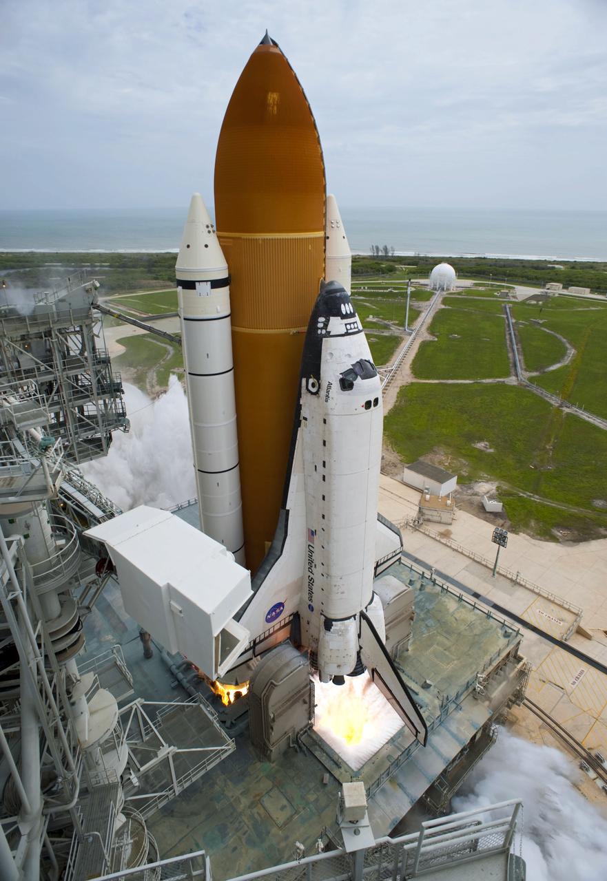 STS135-S-117 (8 July 2011) --- Space shuttle Atlantis and its four-member STS-135 crew head toward Earth orbit and rendezvous with the International Space Station. Liftoff was at 11:29 a.m. (EDT) on July 8, 2011 from Launch Pad 39A at NASA's Kennedy Space Center. Onboard are NASA astronauts Chris Ferguson, commander; Doug Hurley, pilot; Sandy Magnus and Rex Walheim, both mission specialists. STS-135 will deliver the Raffaello multi-purpose logistics module packed with supplies and spare parts for the space station. Atlantis also carries the Robotic Refueling Mission experiment that will investigate the potential for robotically refueling existing satellites in orbit. In addition, Atlantis will return with a failed ammonia pump module to help NASA better understand the failure mechanism and improve pump designs for future systems. STS-135 will be the 33rd flight of Atlantis, the 37th shuttle mission to the space station, and the 135th and final mission of NASA's Space Shuttle Program. Photo credit: NASA