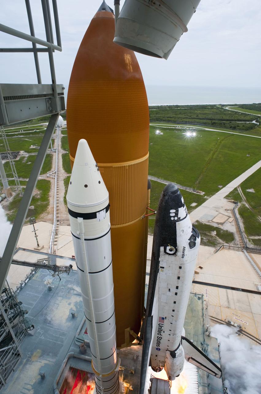 STS135-S-121 (8 July 2011) --- Space shuttle Atlantis' main engines are ignited for liftoff at Launch Pad 39A at NASA's Kennedy Space Center in Florida as it begins its STS-135 mission to the International Space Station. Liftoff was at 11:29 a.m. (EDT) on July 8, 2011. Onboard are NASA astronauts Chris Ferguson, commander; Doug Hurley, pilot; Sandy Magnus and Rex Walheim, both mission specialists. STS-135 will deliver the Raffaello multi-purpose logistics module packed with supplies and spare parts for the space station. Atlantis also carries the Robotic Refueling Mission experiment that will investigate the potential for robotically refueling existing satellites in orbit. In addition, Atlantis will return with a failed ammonia pump module to help NASA better understand the failure mechanism and improve pump designs for future systems. STS-135 will be the 33rd flight of Atlantis, the 37th shuttle mission to the space station, and the 135th and final mission of NASA's Space Shuttle Program. Photo credit: NASA