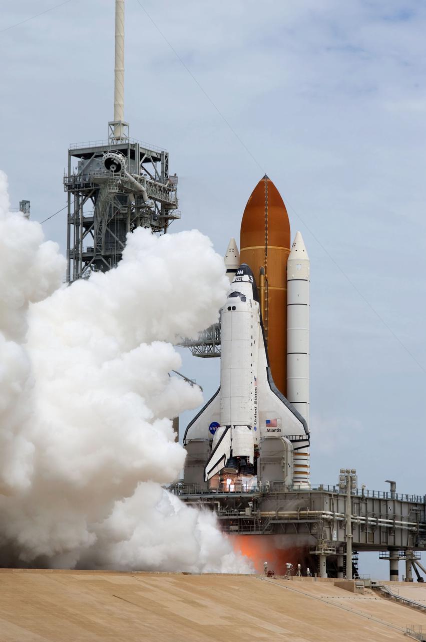 STS135-S-123 (8 July 2011) --- Smoke and steam billow outward as space shuttle Atlantis' main engines are ignited for liftoff at Launch Pad 39A at NASA's Kennedy Space Center in Florida as it begins its STS-135 mission to the International Space Station. Liftoff was at 11:29 a.m. (EDT) on July 8, 2011. Onboard are NASA astronauts Chris Ferguson, commander; Doug Hurley, pilot; Sandy Magnus and Rex Walheim, both mission specialists. STS-135 will deliver the Raffaello multi-purpose logistics module packed with supplies and spare parts for the space station. Atlantis also carries the Robotic Refueling Mission experiment that will investigate the potential for robotically refueling existing satellites in orbit. In addition, Atlantis will return with a failed ammonia pump module to help NASA better understand the failure mechanism and improve pump designs for future systems. STS-135 will be the 33rd flight of Atlantis, the 37th shuttle mission to the space station, and the 135th and final mission of NASA's Space Shuttle Program. Photo credit: NASA