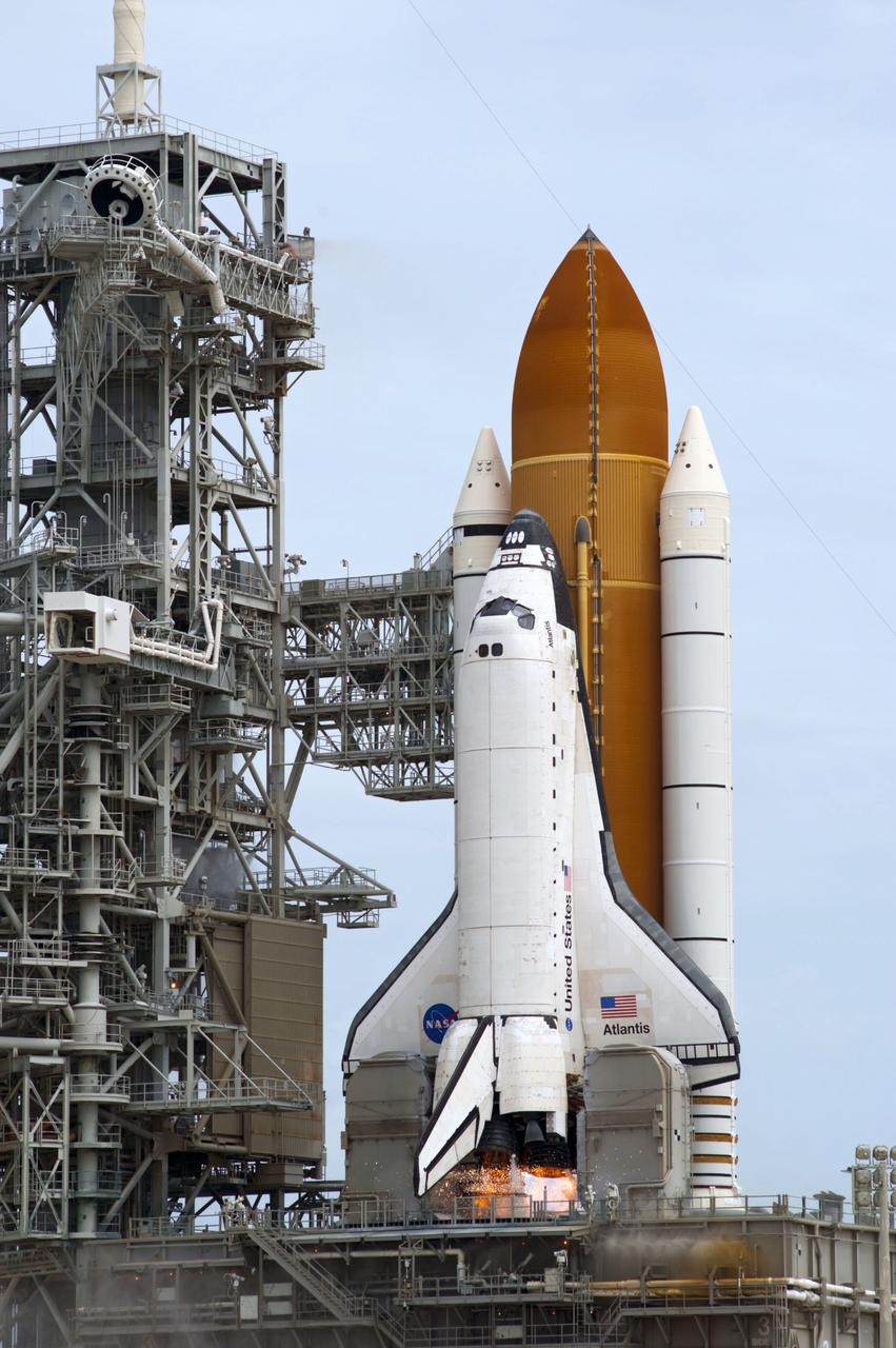 STS135-S-135 (8 July 2011) --- At NASA's Kennedy Space Center in Florida, space shuttle Atlantis' main engines and solid rocket boosters ignite on Launch Pad 39A as it lifts off on its STS-135 mission to the International Space Station. Onboard are NASA astronauts Chris Ferguson, commander; Doug Hurley, pilot; Sandy Magnus and Rex Walheim, both mission specialists. STS-135 will deliver the Raffaello multi-purpose logistics module packed with supplies and spare parts for the space station. Atlantis also carries the Robotic Refueling Mission experiment that will investigate the potential for robotically refueling existing satellites in orbit. In addition, Atlantis will return with a failed ammonia pump module to help NASA better understand the failure mechanism and improve pump designs for future systems. STS-135 will be the 33rd flight of Atlantis, the 37th shuttle mission to the space station, and the 135th and final mission of NASA's Space Shuttle Program. Photo credit: NASA