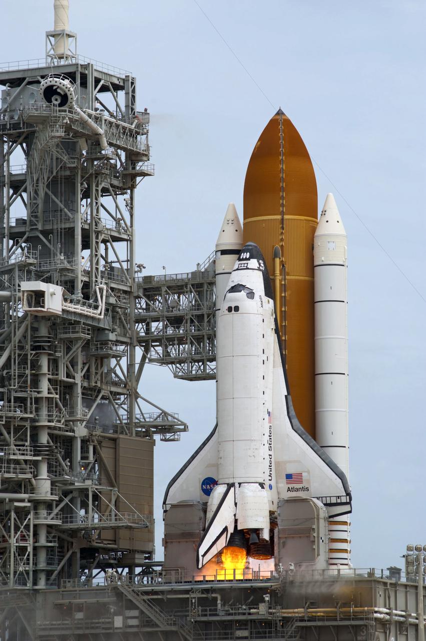 STS135-S-136 (8 July 2011) --- At NASA's Kennedy Space Center in Florida, space shuttle Atlantis' main engines and solid rocket boosters ignite on Launch Pad 39A as it lifts off on its STS-135 mission to the International Space Station. Onboard are NASA astronauts Chris Ferguson, commander; Doug Hurley, pilot; Sandy Magnus and Rex Walheim, both mission specialists. STS-135 will deliver the Raffaello multi-purpose logistics module packed with supplies and spare parts for the space station. Atlantis also carries the Robotic Refueling Mission experiment that will investigate the potential for robotically refueling existing satellites in orbit. In addition, Atlantis will return with a failed ammonia pump module to help NASA better understand the failure mechanism and improve pump designs for future systems. STS-135 will be the 33rd flight of Atlantis, the 37th shuttle mission to the space station, and the 135th and final mission of NASA's Space Shuttle Program. Photo credit: NASA