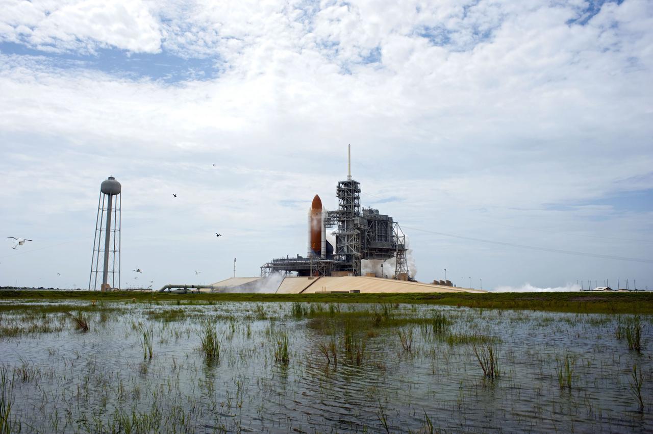 STS135-S-139 (8 July 2011) --- At NASA's Kennedy Space Center in Florida, space shuttle Atlantis' main engines and solid rocket boosters ignite on Launch Pad 39A as it lifts off on its STS-135 mission to the International Space Station. Onboard are NASA astronauts Chris Ferguson, commander; Doug Hurley, pilot; Sandy Magnus and Rex Walheim, both mission specialists. STS-135 will deliver the Raffaello multi-purpose logistics module packed with supplies and spare parts for the space station. Atlantis also carries the Robotic Refueling Mission experiment that will investigate the potential for robotically refueling existing satellites in orbit. In addition, Atlantis will return with a failed ammonia pump module to help NASA better understand the failure mechanism and improve pump designs for future systems. STS-135 will be the 33rd flight of Atlantis, the 37th shuttle mission to the space station, and the 135th and final mission of NASA's Space Shuttle Program. Photo credit: NASA