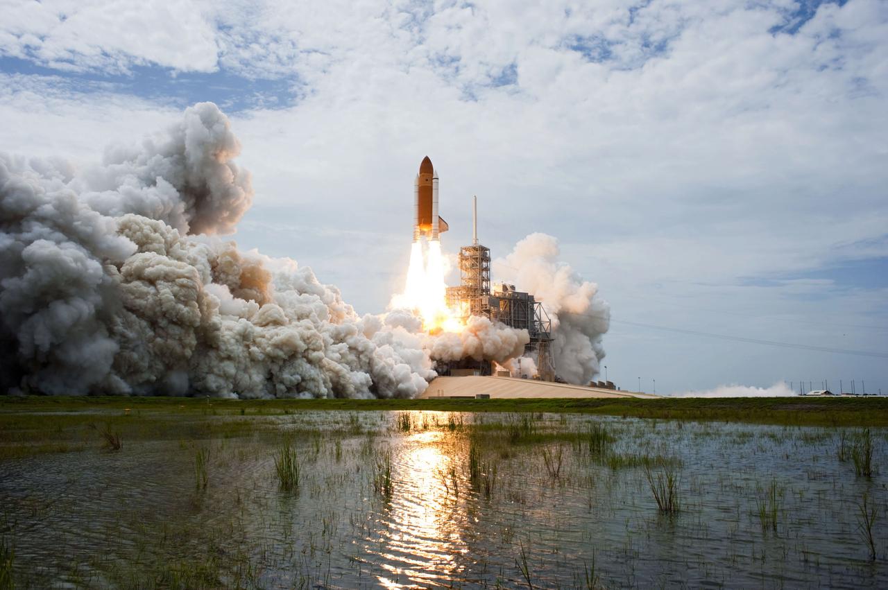STS135-S-141 (8 July 2011) --- Space shuttle Atlantis and its four-member STS-135 crew head toward Earth orbit and rendezvous with the International Space Station. Liftoff was at 11:29 a.m. (EDT) on July 8, 2011 from Launch Pad 39A at NASA's Kennedy Space Center. Onboard are NASA astronauts Chris Ferguson, commander; Doug Hurley, pilot; Sandy Magnus and Rex Walheim, both mission specialists. STS-135 will deliver the Raffaello multi-purpose logistics module packed with supplies and spare parts for the space station. Atlantis also carries the Robotic Refueling Mission experiment that will investigate the potential for robotically refueling existing satellites in orbit. In addition, Atlantis will return with a failed ammonia pump module to help NASA better understand the failure mechanism and improve pump designs for future systems. STS-135 will be the 33rd flight of Atlantis, the 37th shuttle mission to the space station, and the 135th and final mission of NASA's Space Shuttle Program. Photo credit: NASA