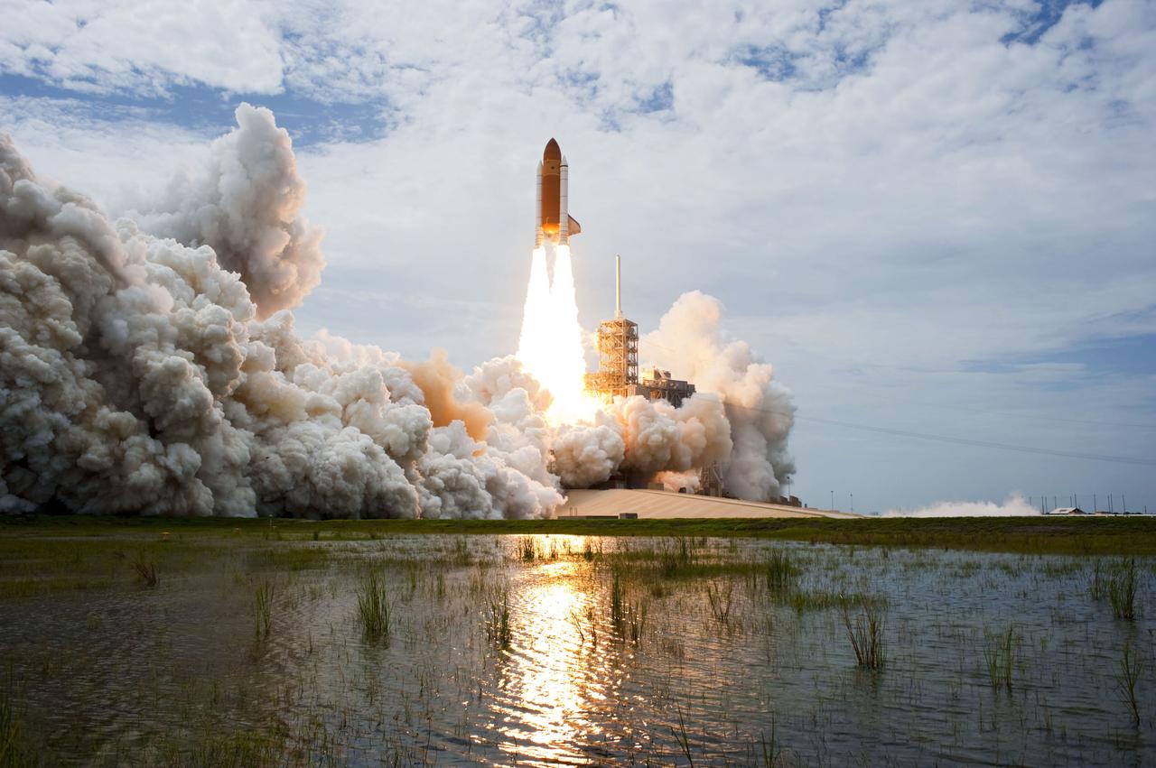 STS135-S-142 (8 July 2011) --- Space shuttle Atlantis and its four-member STS-135 crew head toward Earth orbit and rendezvous with the International Space Station. Liftoff was at 11:29 a.m. (EDT) on July 8, 2011 from Launch Pad 39A at NASA's Kennedy Space Center. Onboard are NASA astronauts Chris Ferguson, commander; Doug Hurley, pilot; Sandy Magnus and Rex Walheim, both mission specialists. STS-135 will deliver the Raffaello multi-purpose logistics module packed with supplies and spare parts for the space station. Atlantis also carries the Robotic Refueling Mission experiment that will investigate the potential for robotically refueling existing satellites in orbit. In addition, Atlantis will return with a failed ammonia pump module to help NASA better understand the failure mechanism and improve pump designs for future systems. STS-135 will be the 33rd flight of Atlantis, the 37th shuttle mission to the space station, and the 135th and final mission of NASA's Space Shuttle Program. Photo credit: NASA