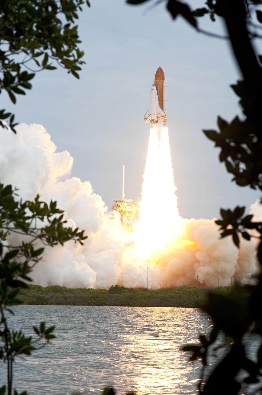 STS135-S-148 (8 July 2011) --- Space shuttle Atlantis and its four-member STS-135 crew head toward Earth orbit and rendezvous with the International Space Station. Liftoff was at 11:29 a.m. (EDT) on July 8, 2011 from Launch Pad 39A at NASA's Kennedy Space Center. Onboard are NASA astronauts Chris Ferguson, commander; Doug Hurley, pilot; Sandy Magnus and Rex Walheim, both mission specialists. STS-135 will deliver the Raffaello multi-purpose logistics module packed with supplies and spare parts for the space station. Atlantis also carries the Robotic Refueling Mission experiment that will investigate the potential for robotically refueling existing satellites in orbit. In addition, Atlantis will return with a failed ammonia pump module to help NASA better understand the failure mechanism and improve pump designs for future systems. STS-135 will be the 33rd flight of Atlantis, the 37th shuttle mission to the space station, and the 135th and final mission of NASA's Space Shuttle Program. Photo credit: NASA