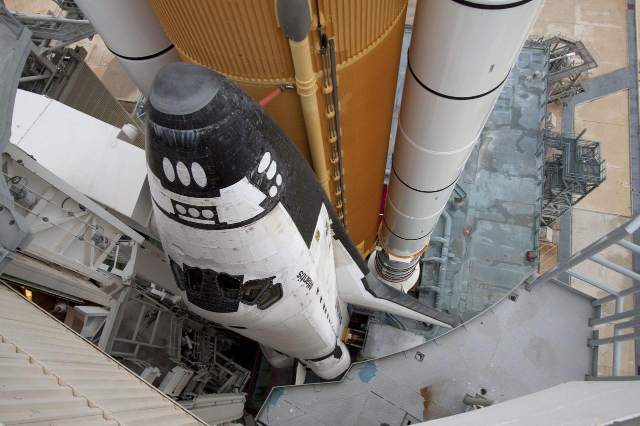 STS135-S-151 (8 July 2011) --- Space shuttle Atlantis is pictured on Launch Pad 39A at NASA's Kennedy Space Center in Florida following the move of the rotating service structure (RSS). The structure provides weather protection and access to the shuttle while it awaits liftoff on the pad. RSS "rollback" marks a major milestone in Atlantis' STS-135 mission countdown. Liftoff was at 11:29 a.m. (EDT) on July 8, 2011. Onboard are NASA astronauts Chris Ferguson, commander; Doug Hurley, pilot; Sandy Magnus and Rex Walheim, both mission specialists. STS-135 will deliver the Raffaello multi-purpose logistics module packed with supplies and spare parts for the space station. Atlantis also carries the Robotic Refueling Mission experiment that will investigate the potential for robotically refueling existing satellites in orbit. In addition, Atlantis will return with a failed ammonia pump module to help NASA better understand the failure mechanism and improve pump designs for future systems. STS-135 will be the 33rd flight of Atlantis, the 37th shuttle mission to the space station, and the 135th and final mission of NASA's Space Shuttle Program. Photo credit: NASA